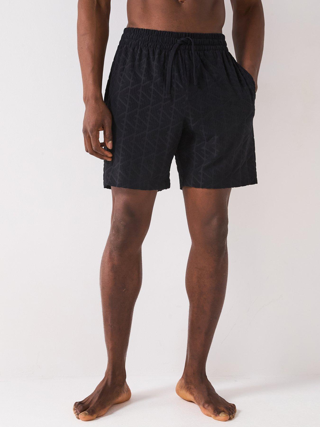  image of emporio-armani-bodywear-terry-tonal-printed-bermuda-shorts-black