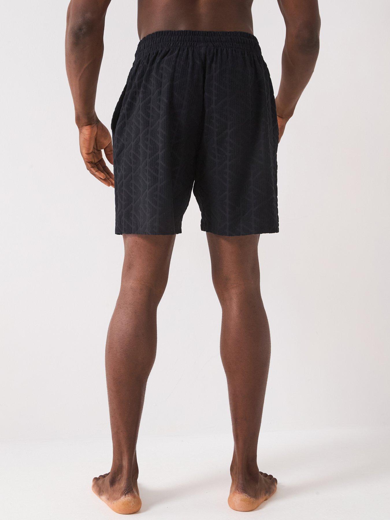  image of emporio-armani-bodywear-terry-tonal-printed-bermuda-shorts-black