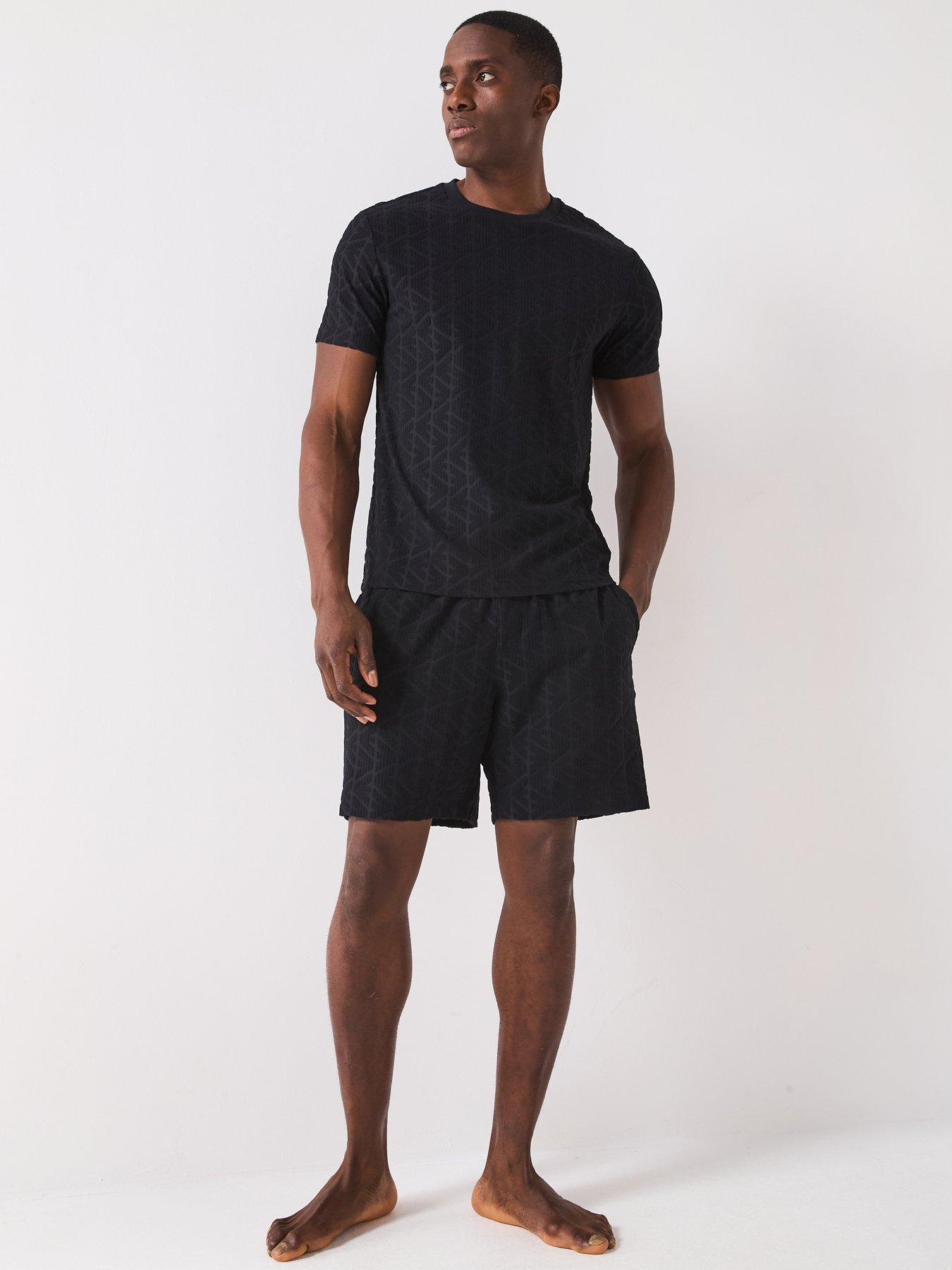  image of emporio-armani-bodywear-terry-tonal-printed-bermuda-shorts-black