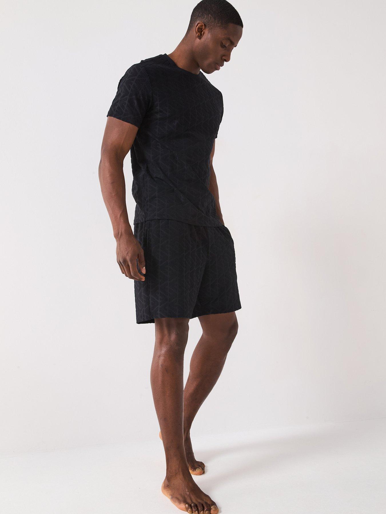  image of emporio-armani-bodywear-terry-tonal-printed-bermuda-shorts-black
