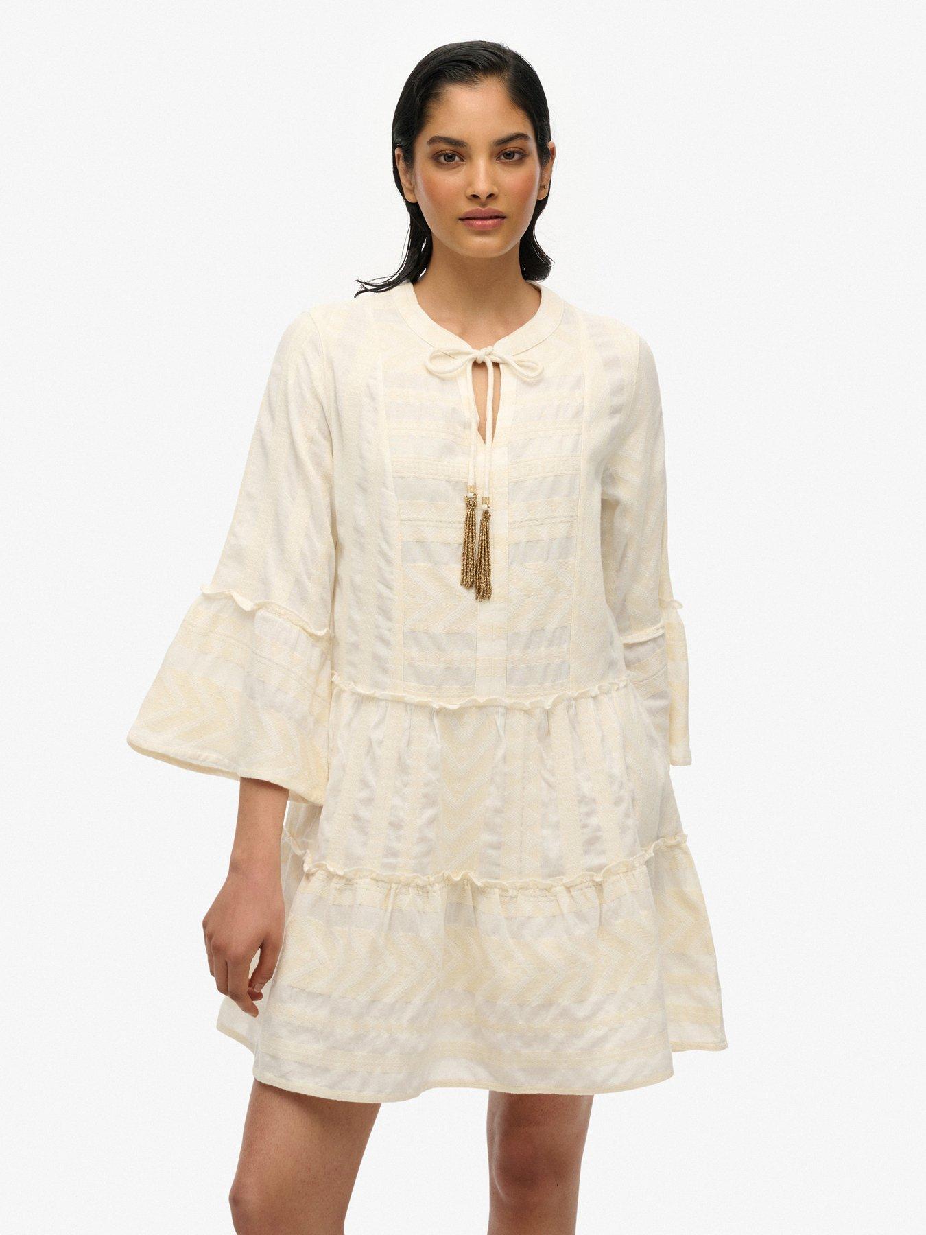 undefined Ibiza Long Sleeve Tiered Mini Dress - Cream