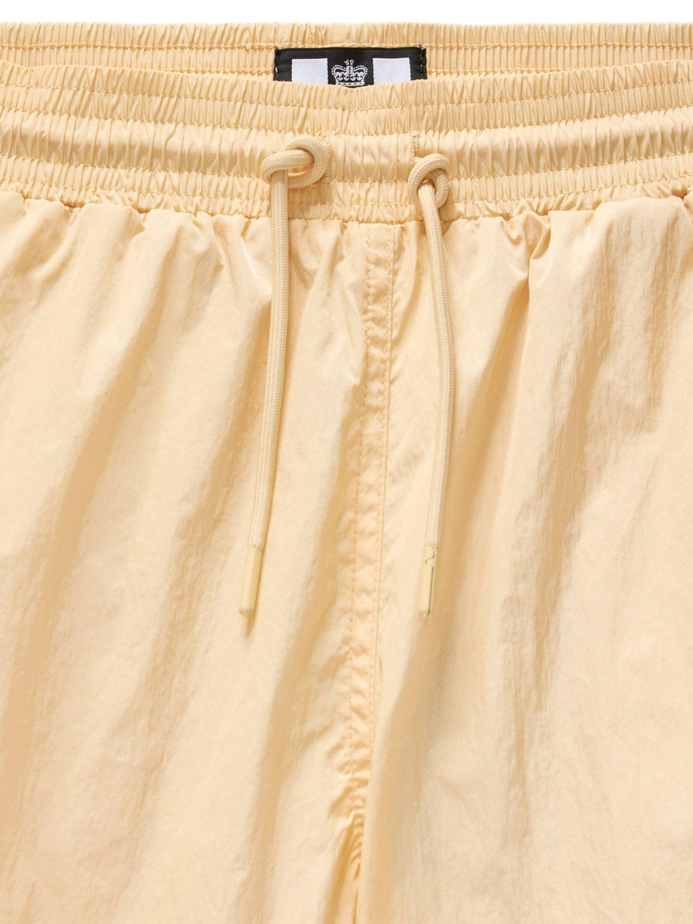  image of weekend-offender-stacks-nylon-swim-short-gold