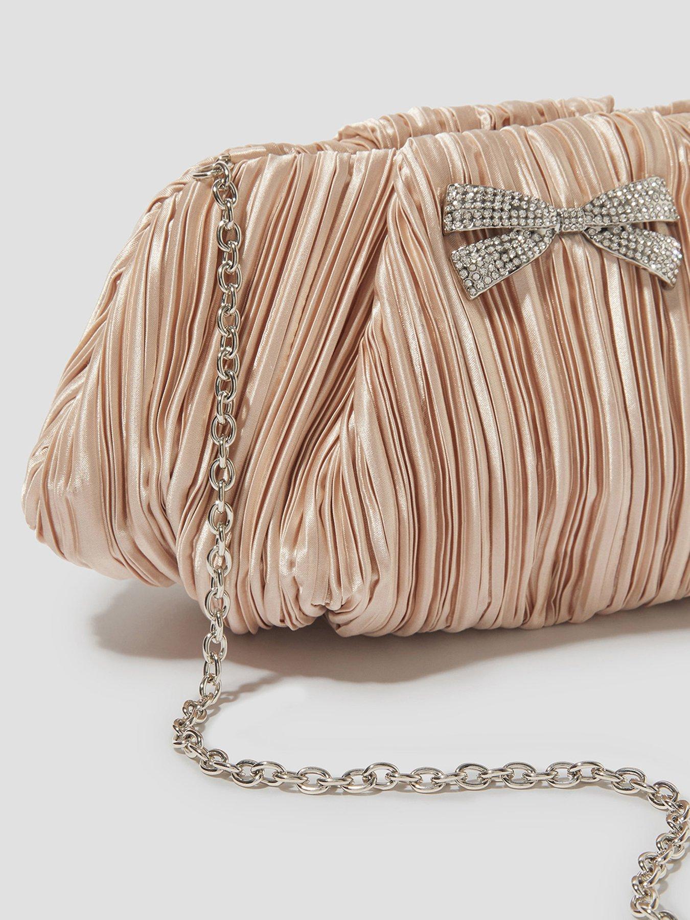  image of monsoon-pen-pleated-bow-clutch-pink