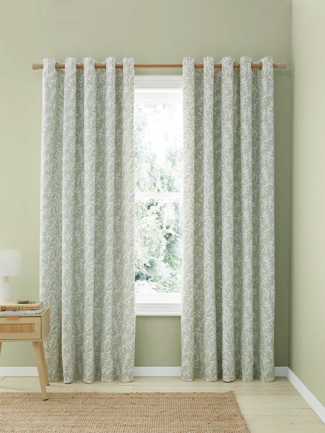  image of catherine-lansfield-sorrel-leaf-reversible-eyelet-curtains-in-green