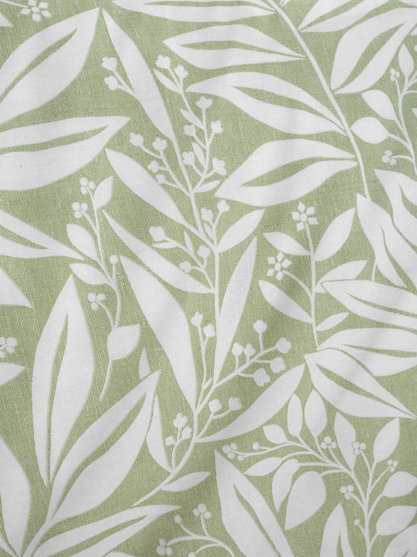  image of catherine-lansfield-sorrel-leaf-reversible-eyelet-curtains-in-green
