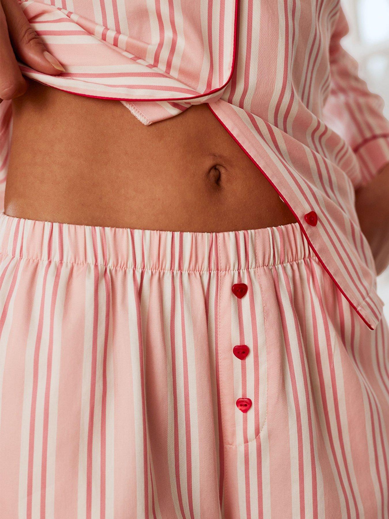  image of chelsea-peers-long-pyjama-set-striped-with-heart-buttons-pink