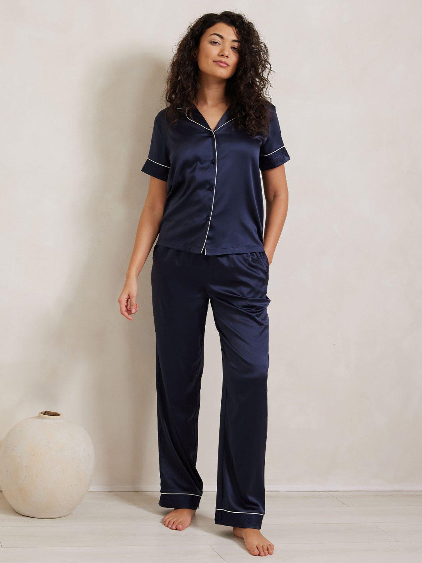 Image 1 of 5 of CHELSEA PEERS Satin Lace Trim Short Sleeve Long Pyjama Set - Navy