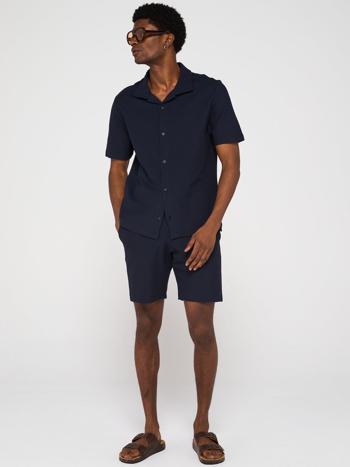  image of mango-perec-casual-textured-button-through-jersey-shirt-navy