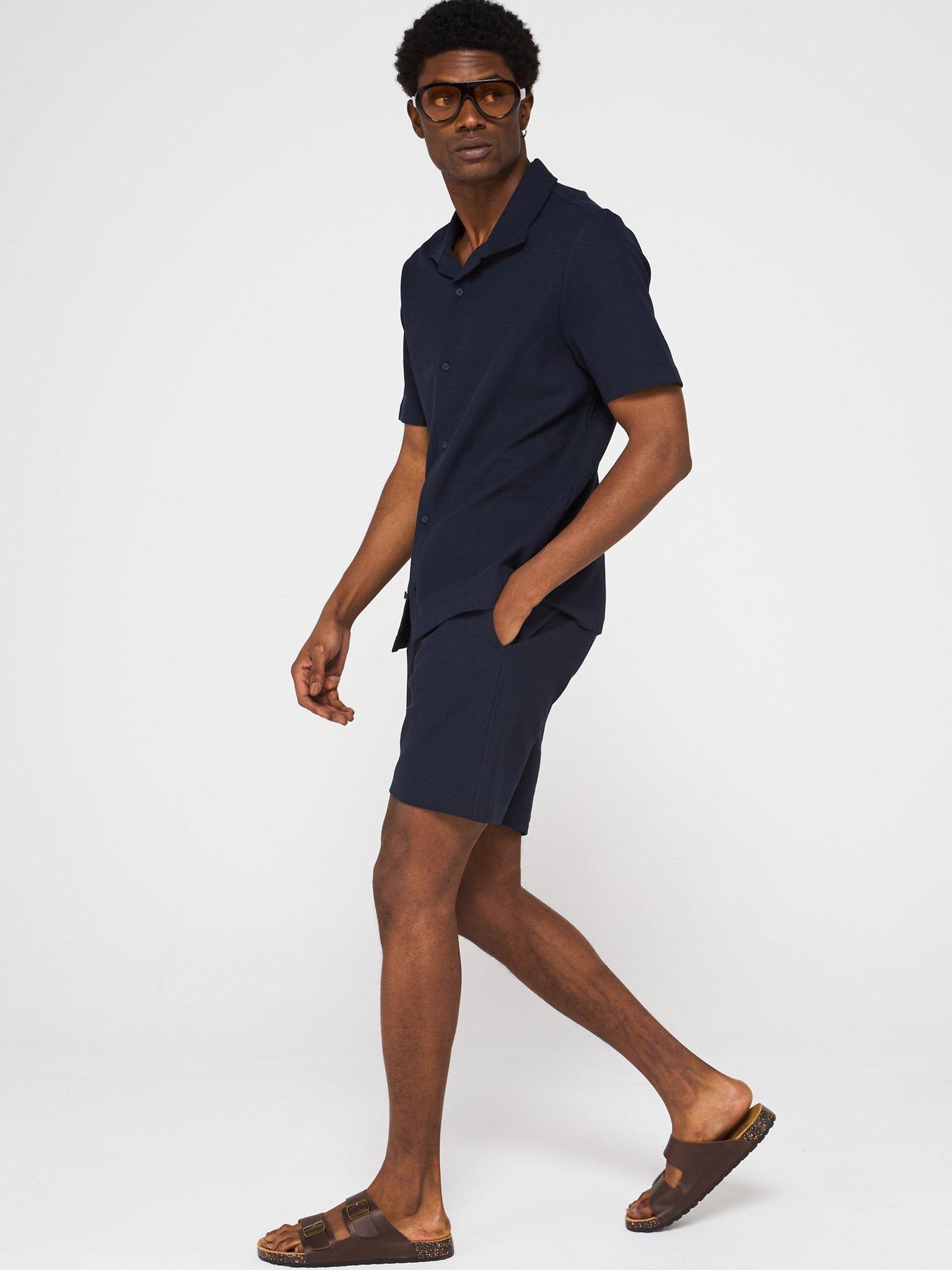  image of mango-perec-casual-textured-button-through-jersey-shirt-navy