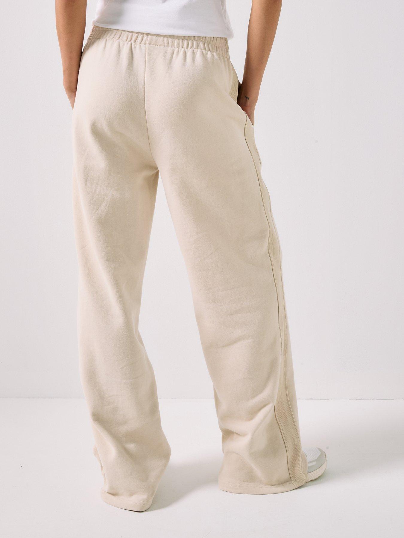  image of pe-nation-womens-training-adventure-trackpant-beige