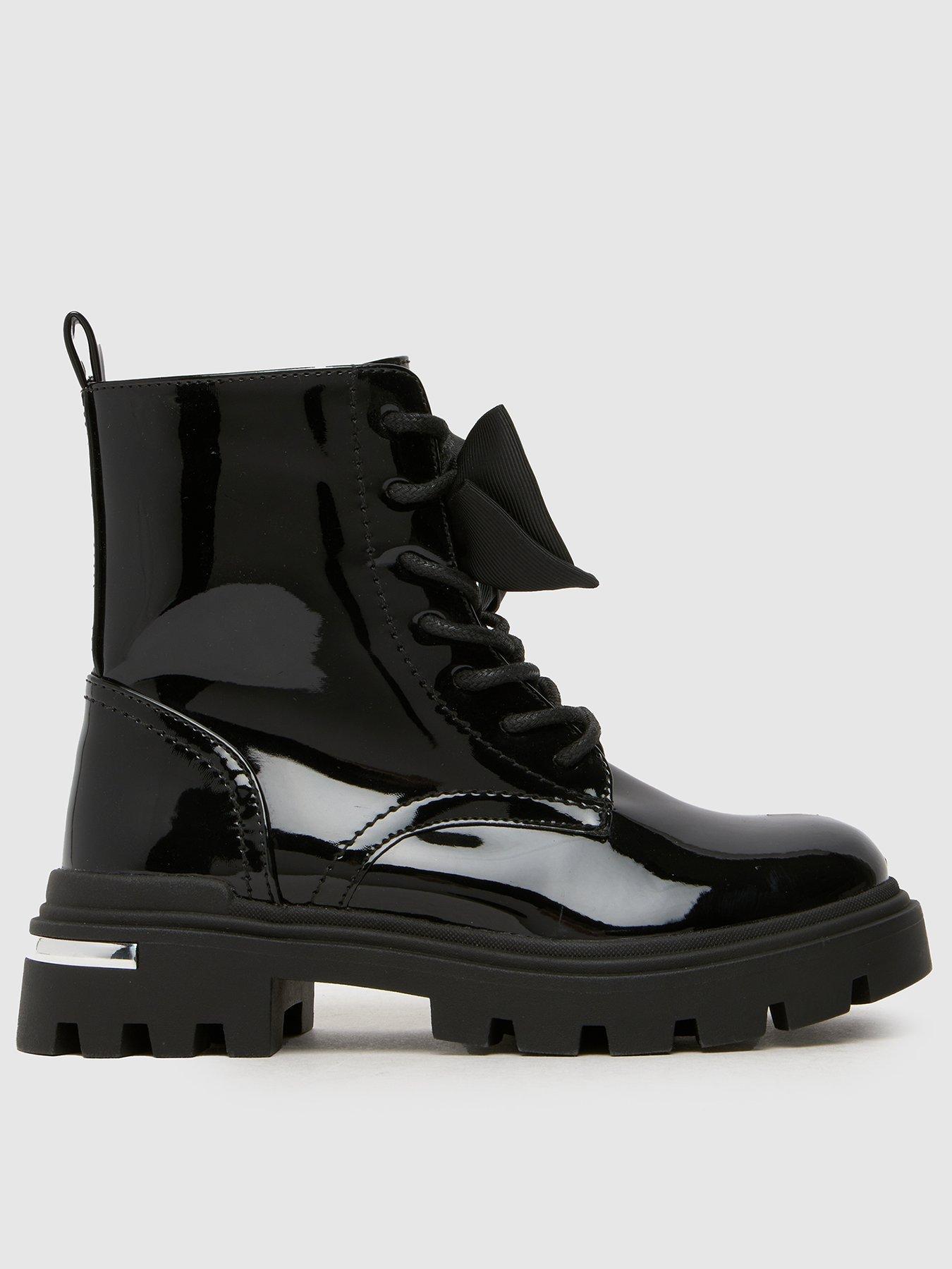  image of schuh-callie-bow-junior-patent-boot-black