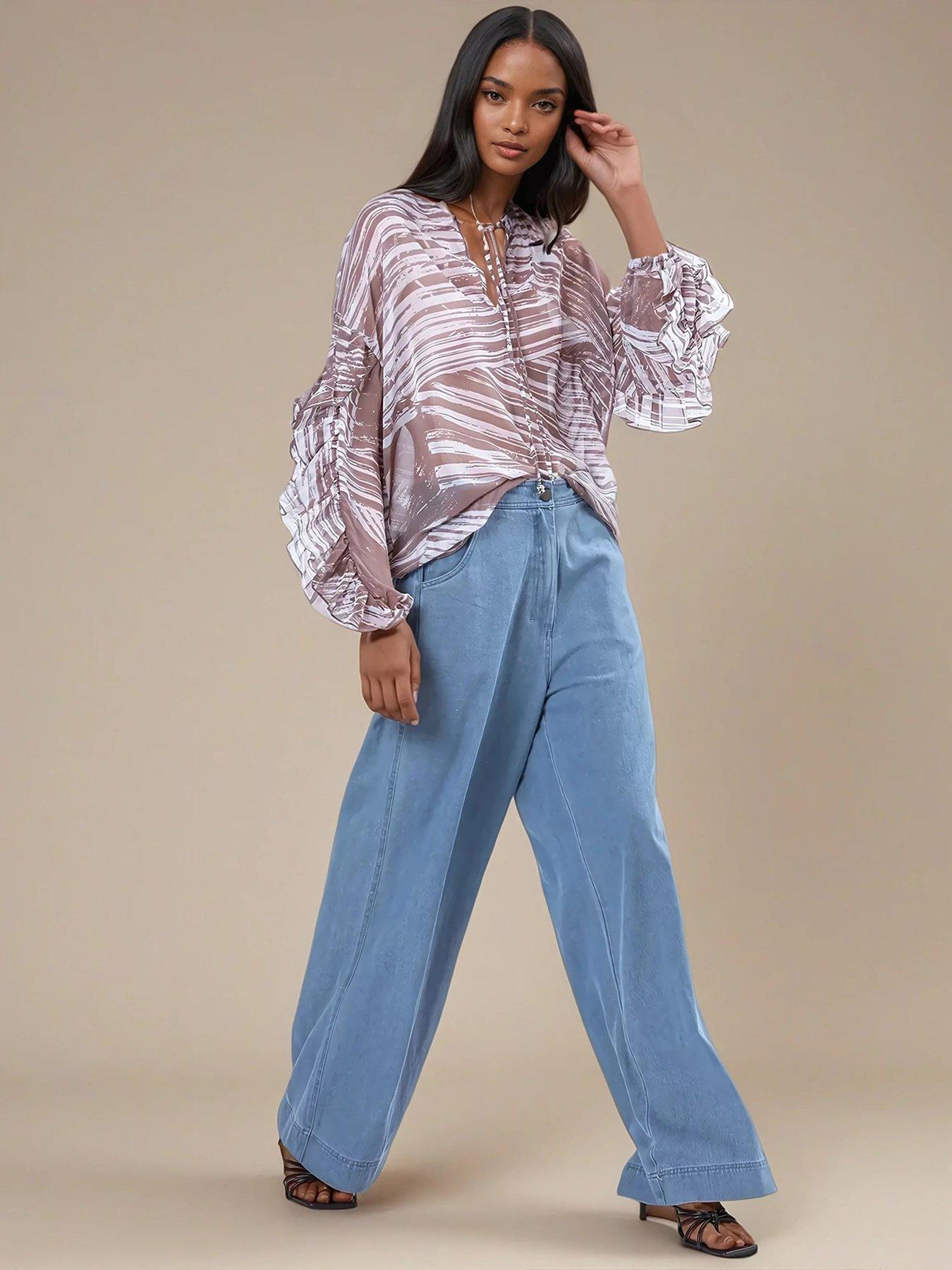  image of religion-callisto-frill-long-sleeve-oversized-blouse-beige