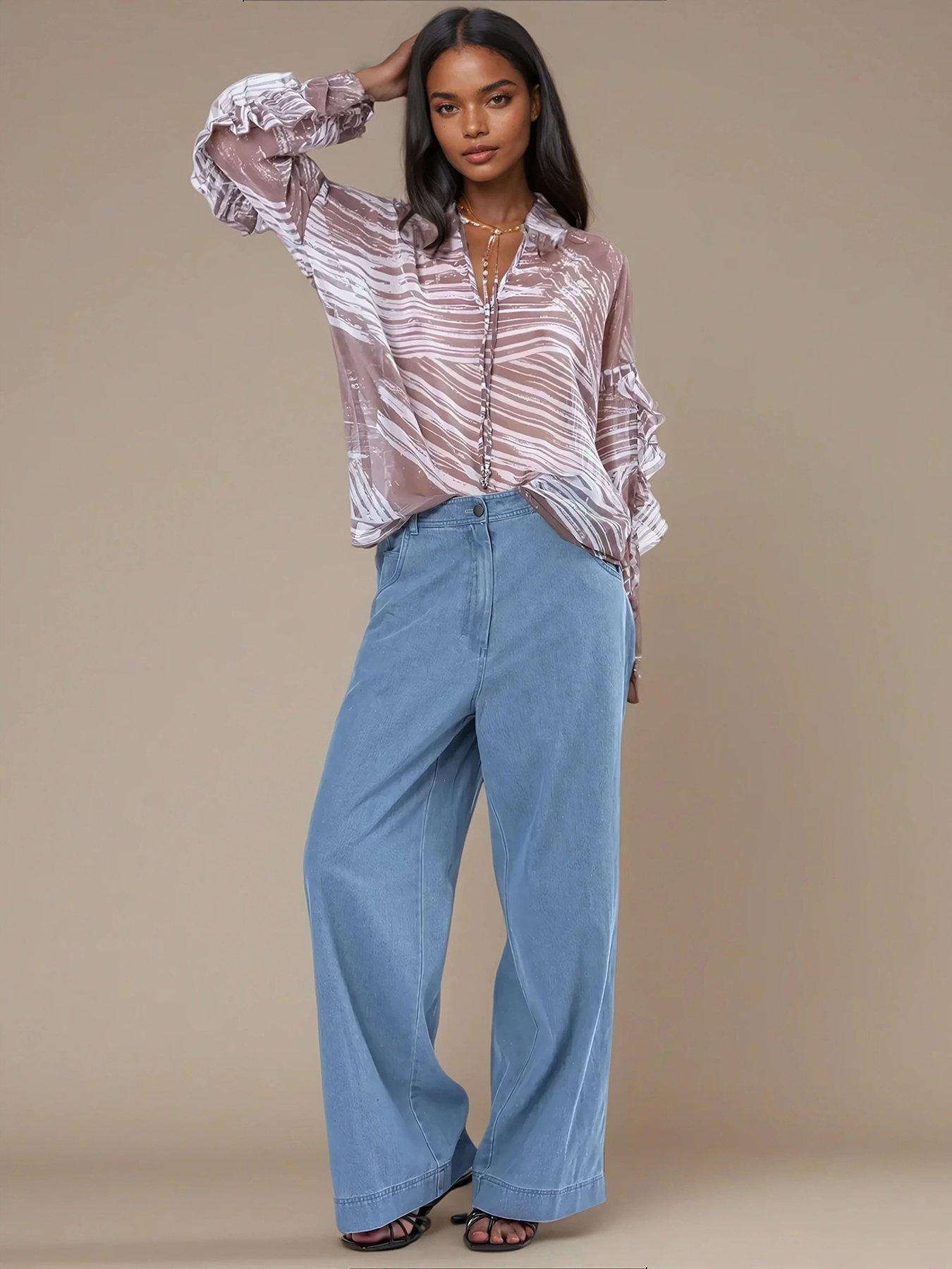  image of religion-callisto-frill-long-sleeve-oversized-blouse-beige