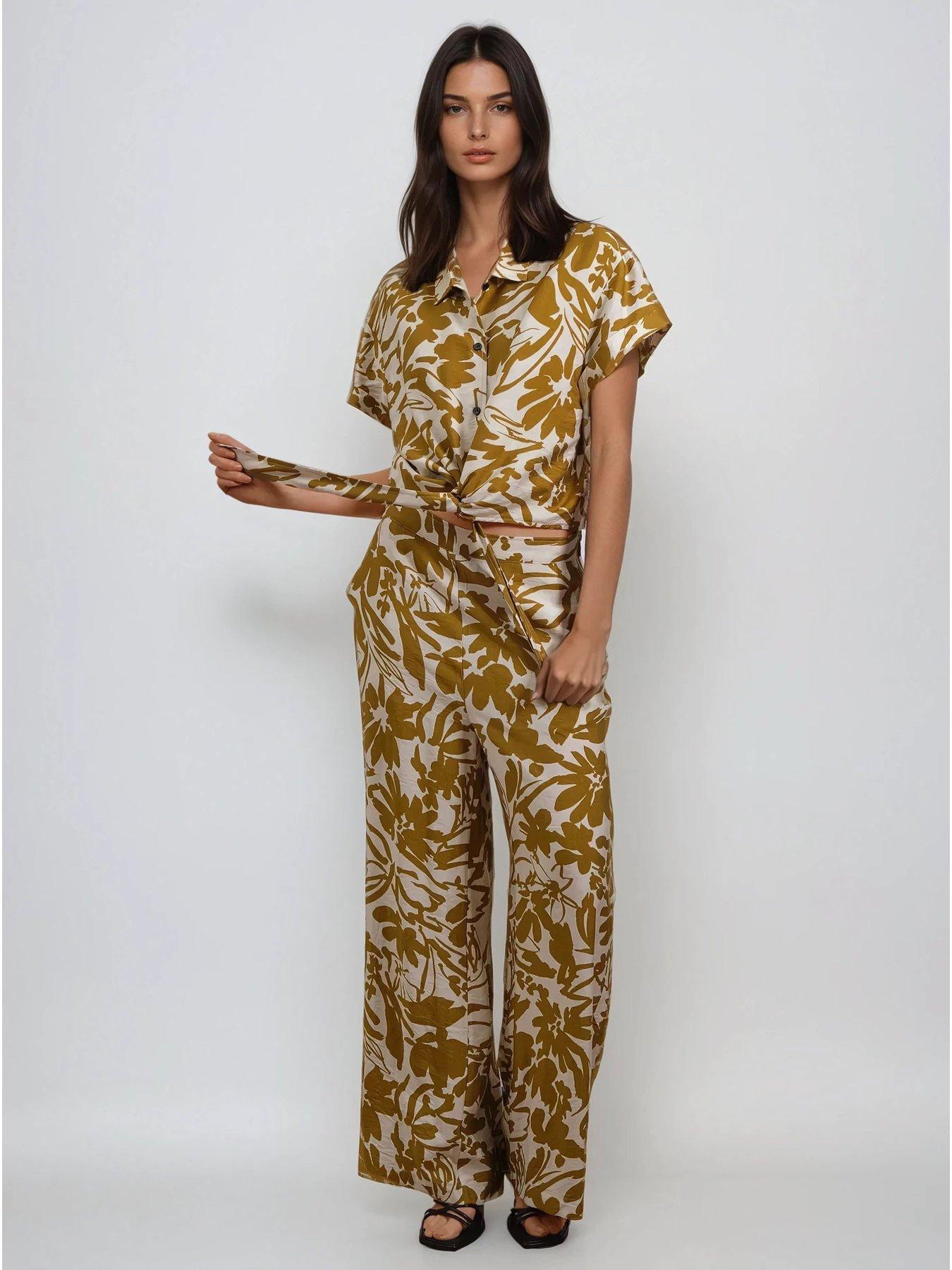  image of religion-element-tie-front-shirt-in-bright-floral-yellow
