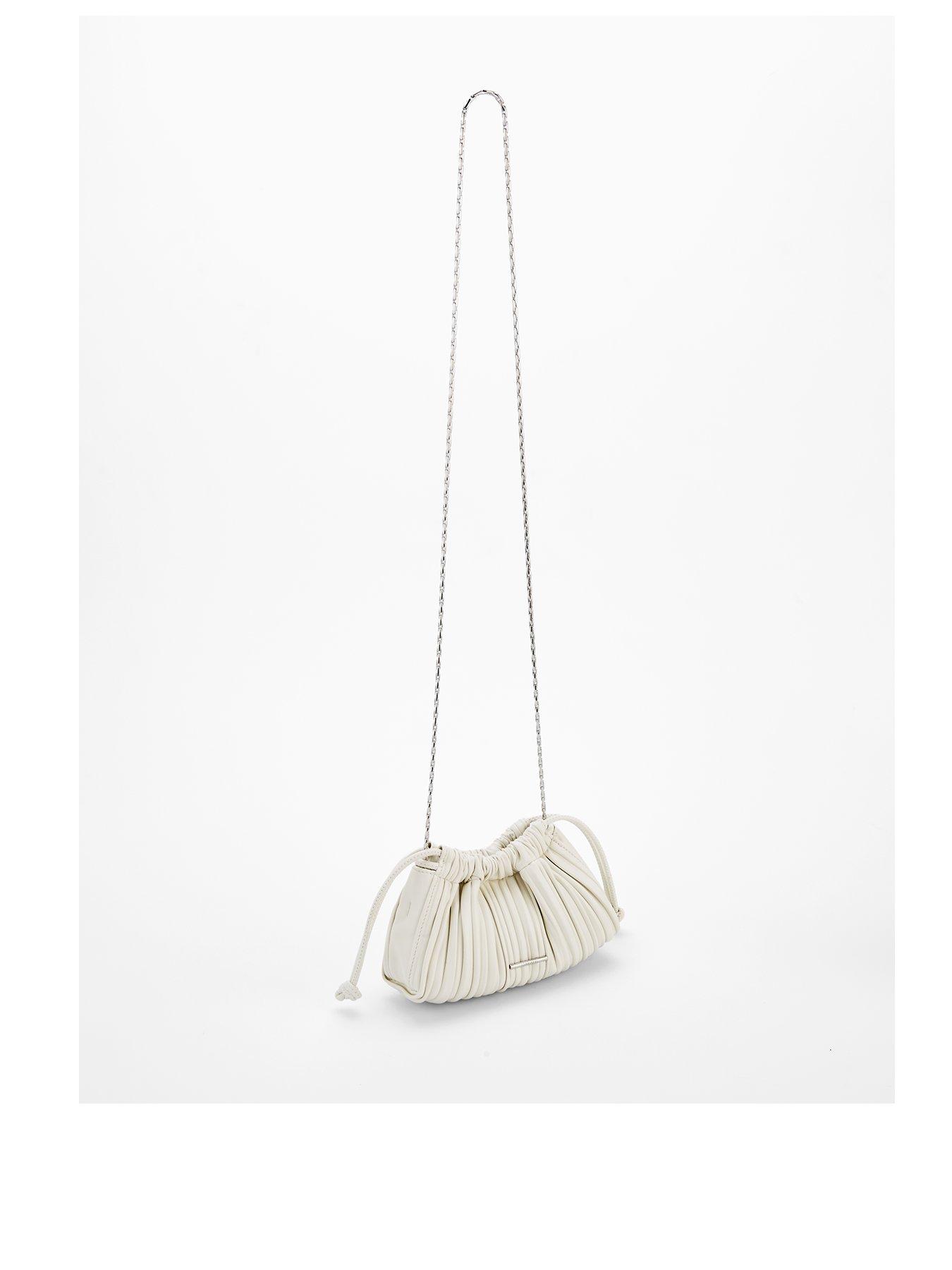 Image 2 of 4 of Calvin Klein Gathered Drawstring Crossbody Bag & White