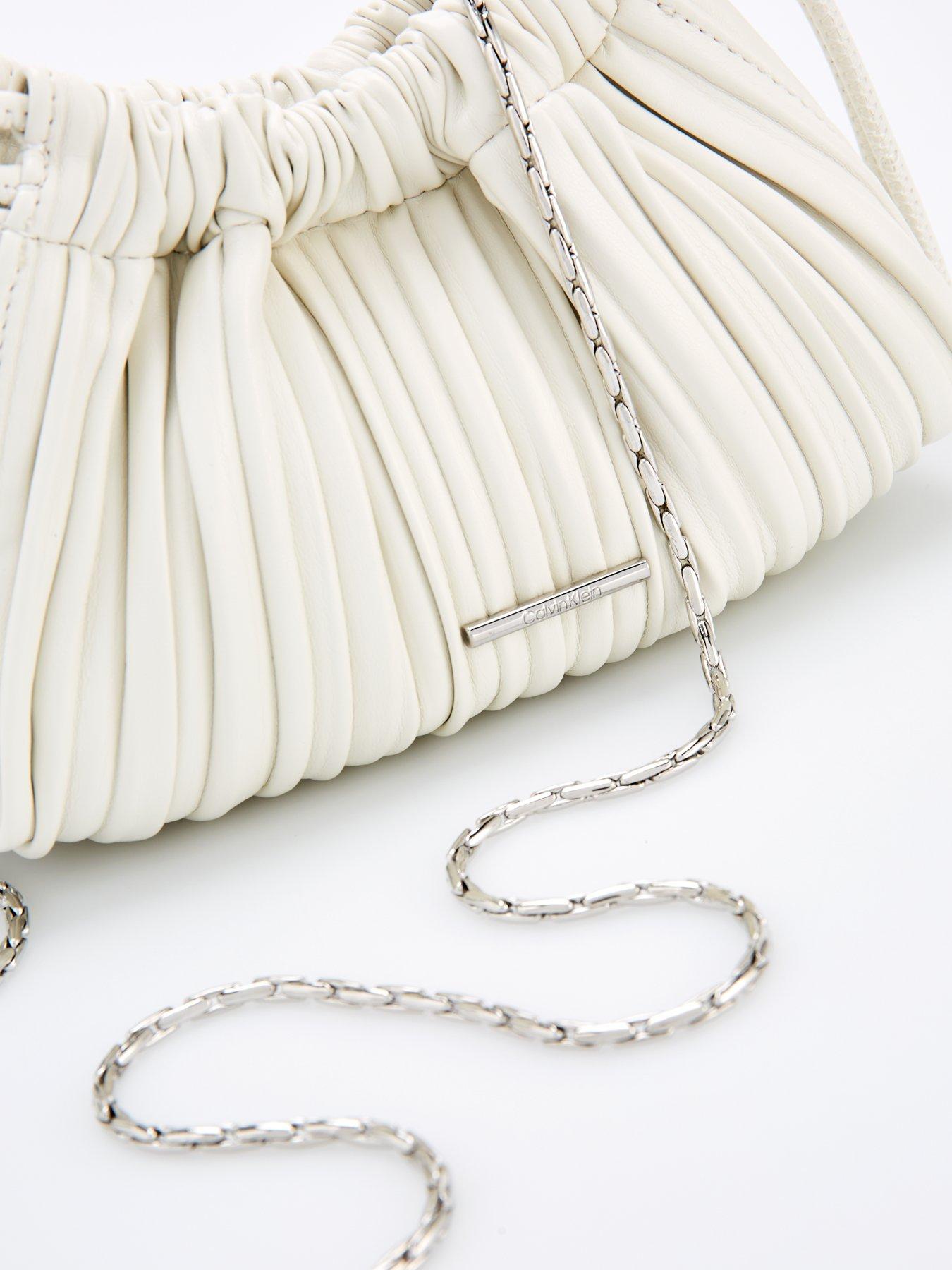 Image 3 of 4 of Calvin Klein Gathered Drawstring Crossbody Bag & White