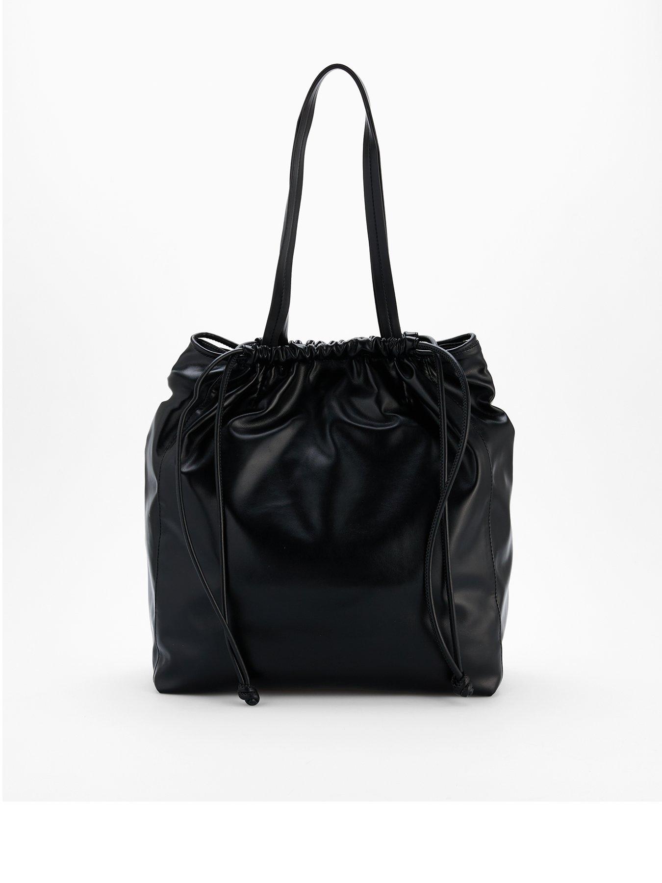 Image 1 of 4 of Calvin Klein Drawstring Tote &amp; Black
