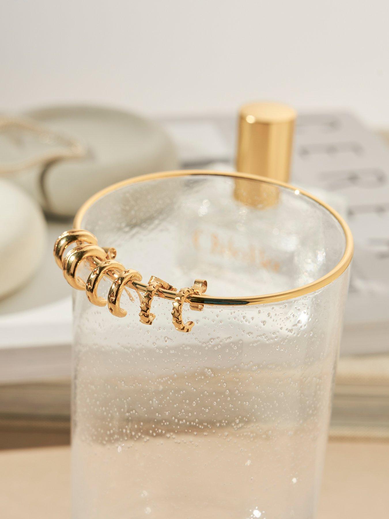  image of chlobo-gold-tiny-multi-star-huggie-hoops