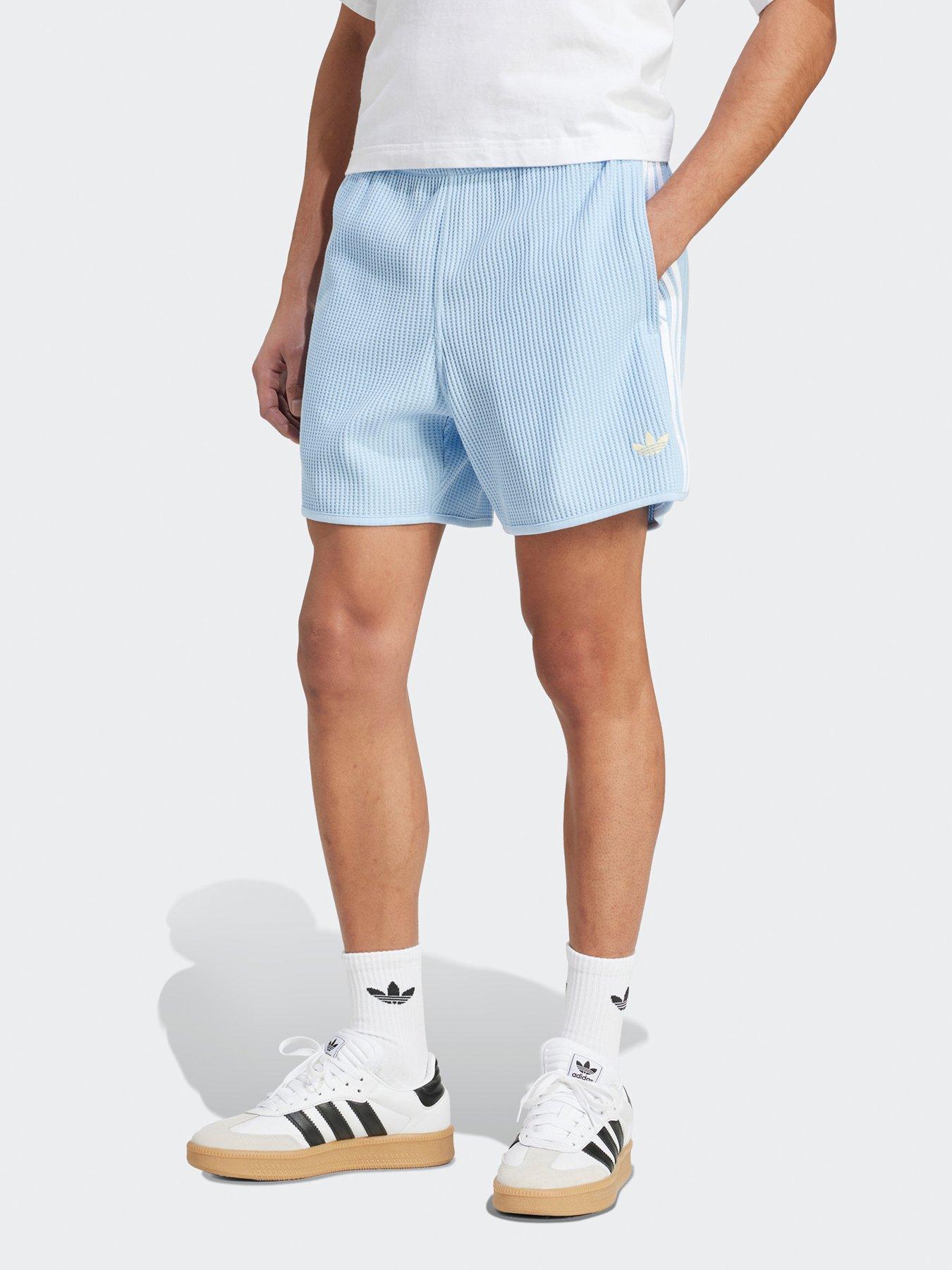front image of adidas-originals-mens-waffle-knit-sprinter-shorts-blue