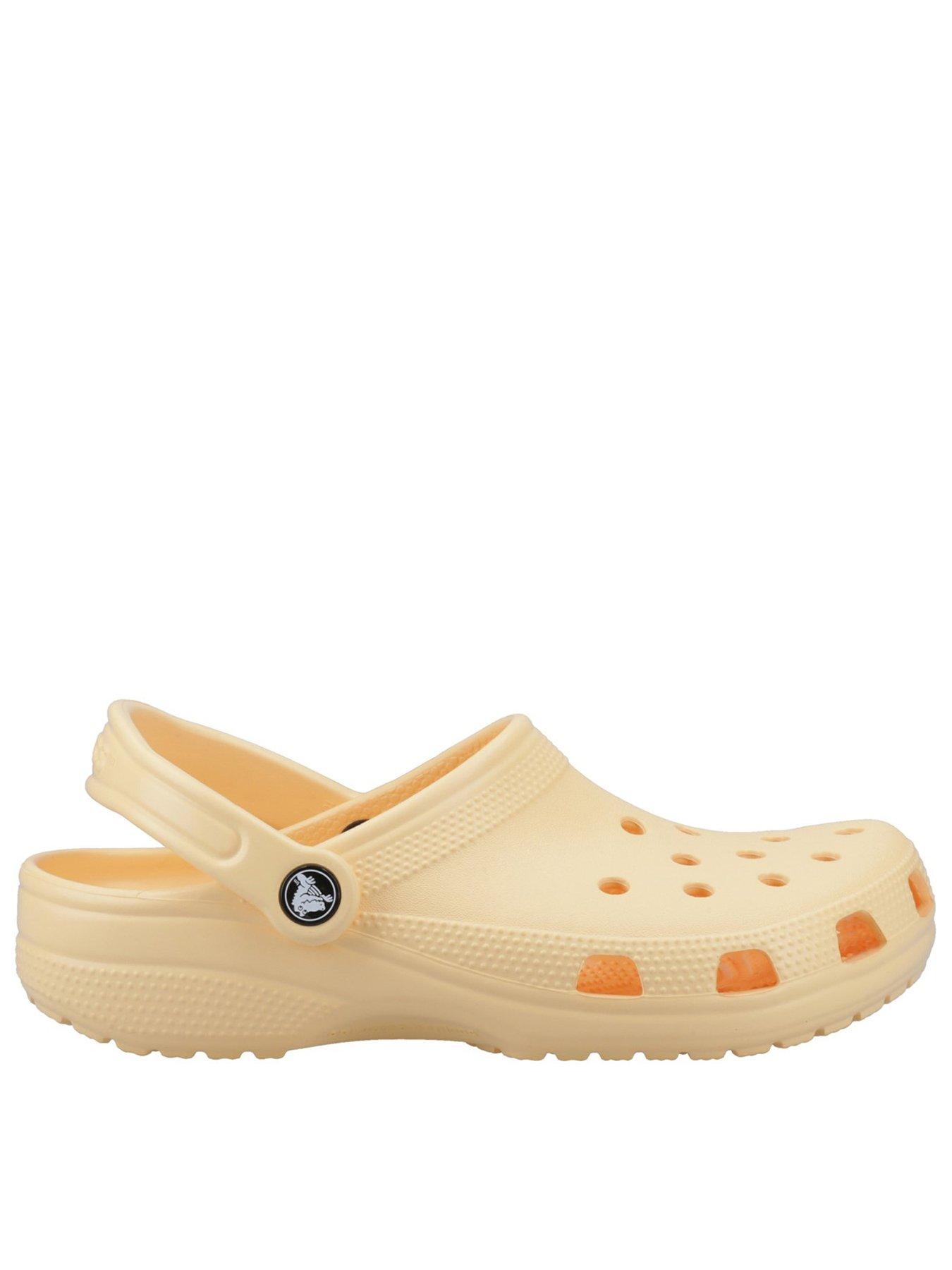 front image of crocs-classic-clog-light-gold