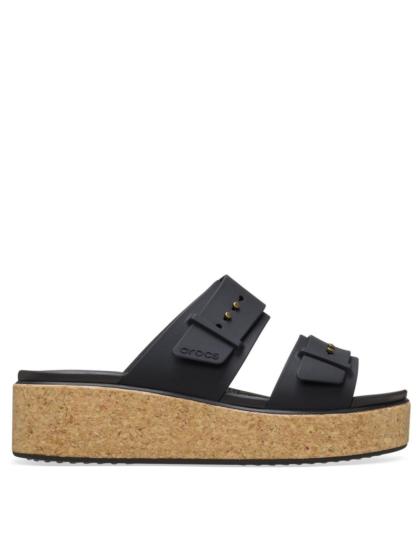 front image of crocs-brooklyn-buckle-cork-low-wedge-sandal-black