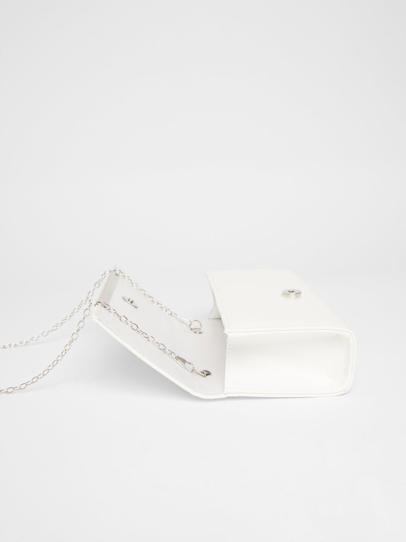  image of quiz-white-metallic-clutch-bag