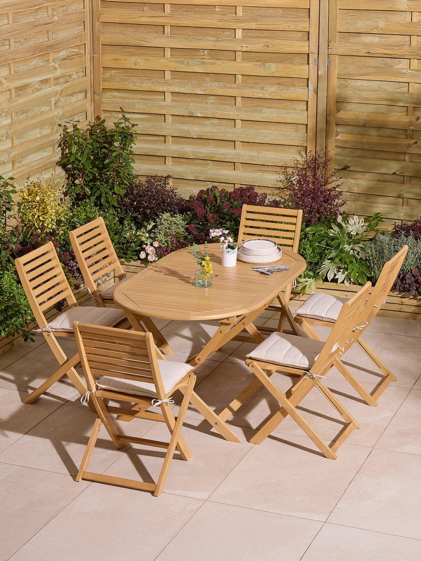 rowlinson-ashdown-folding-6-seat-oval-dining-set-with-cushions