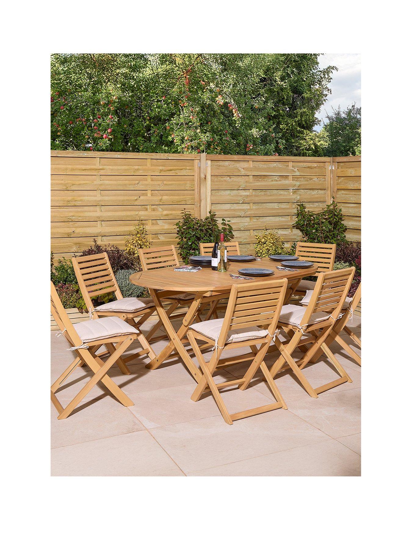  image of rowlinson-ashdown-folding-8-seat-oval-dining-set-with-cushions