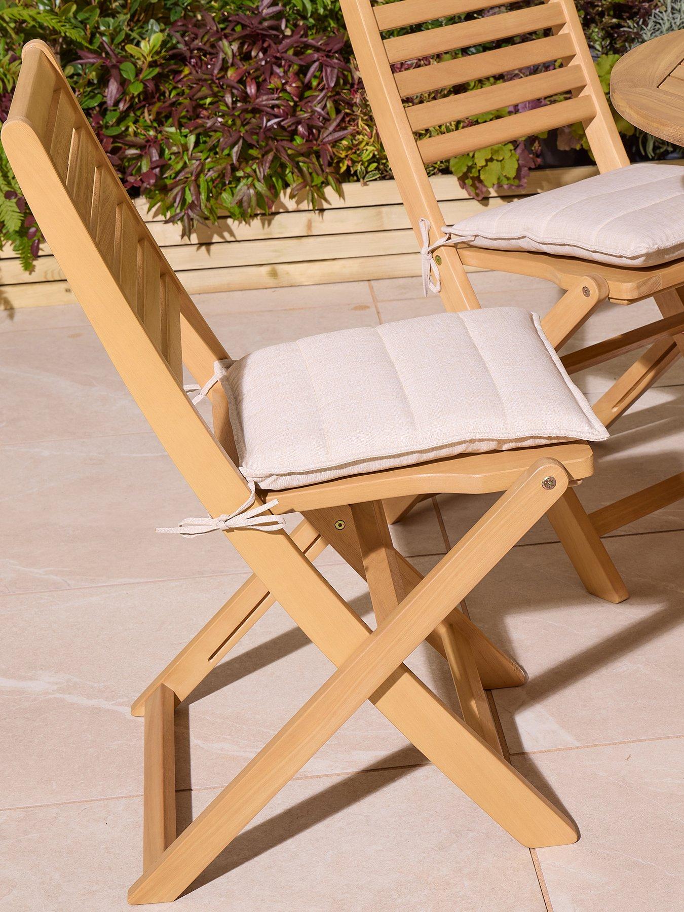  image of rowlinson-ashdown-folding-8-seat-oval-dining-set-with-cushions