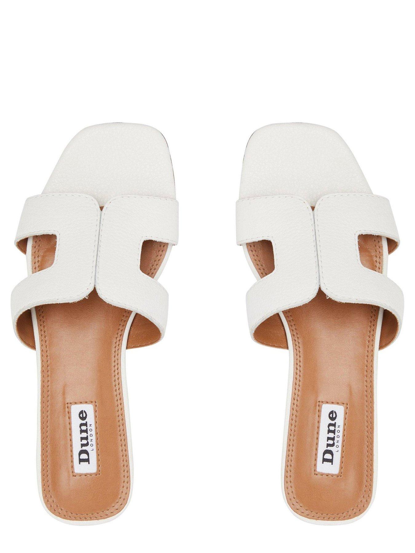  image of dune-london-loupe-leather-smart-slider-sandals-white