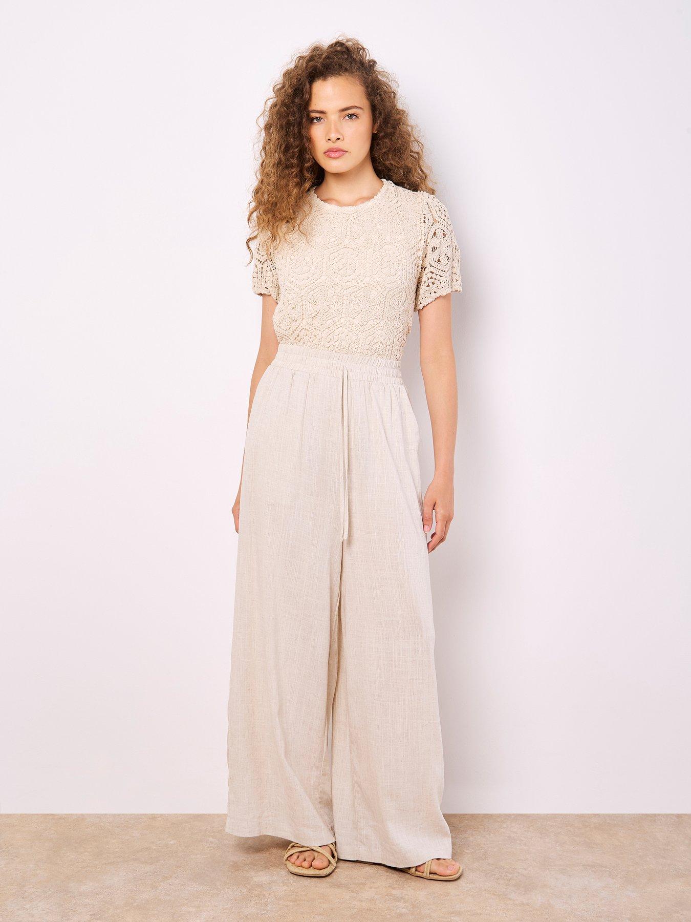  image of apricot-crochet-circles-puff-sleeve-tee-stone