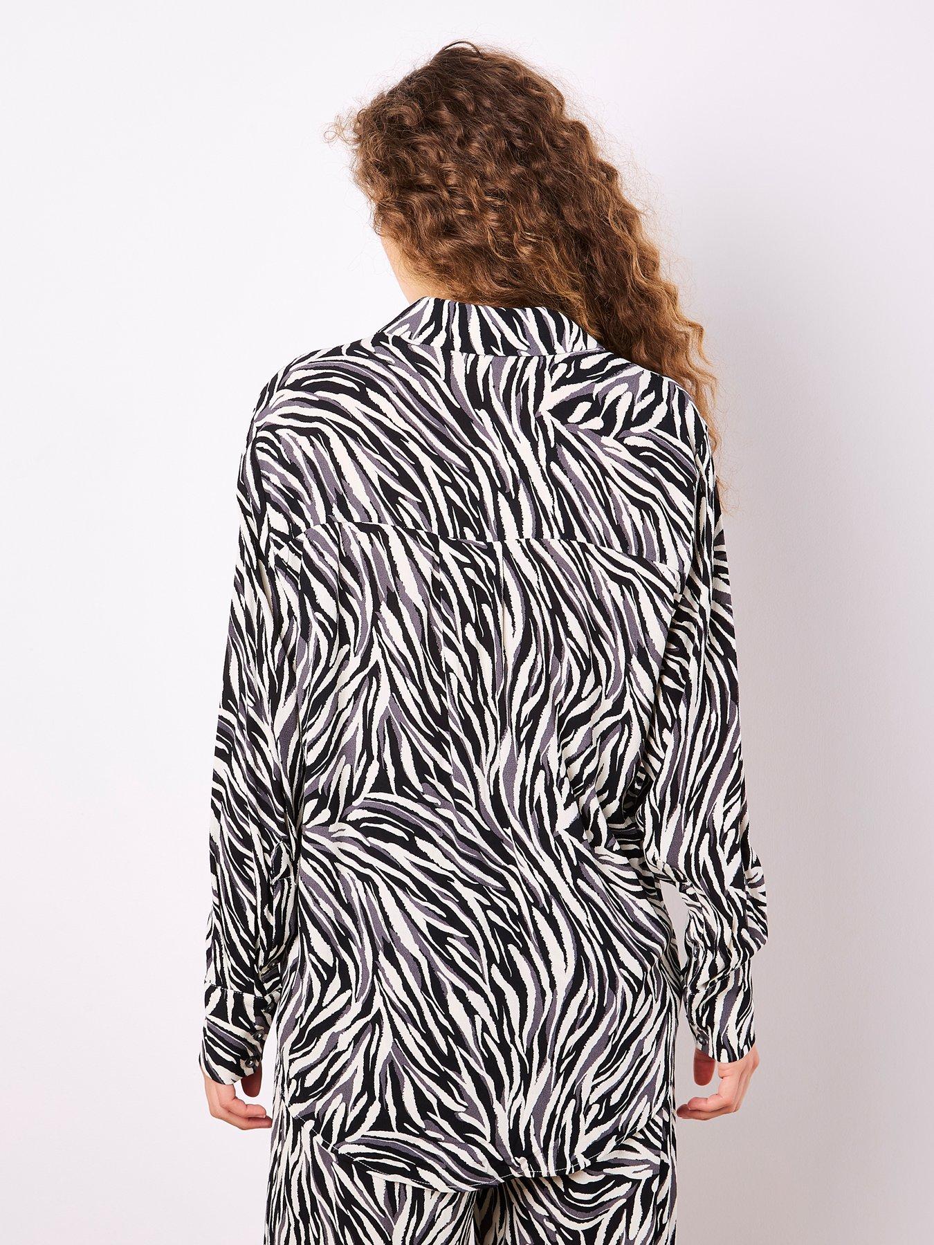 image of apricot-zebra-printed-high-low-shirt-stone