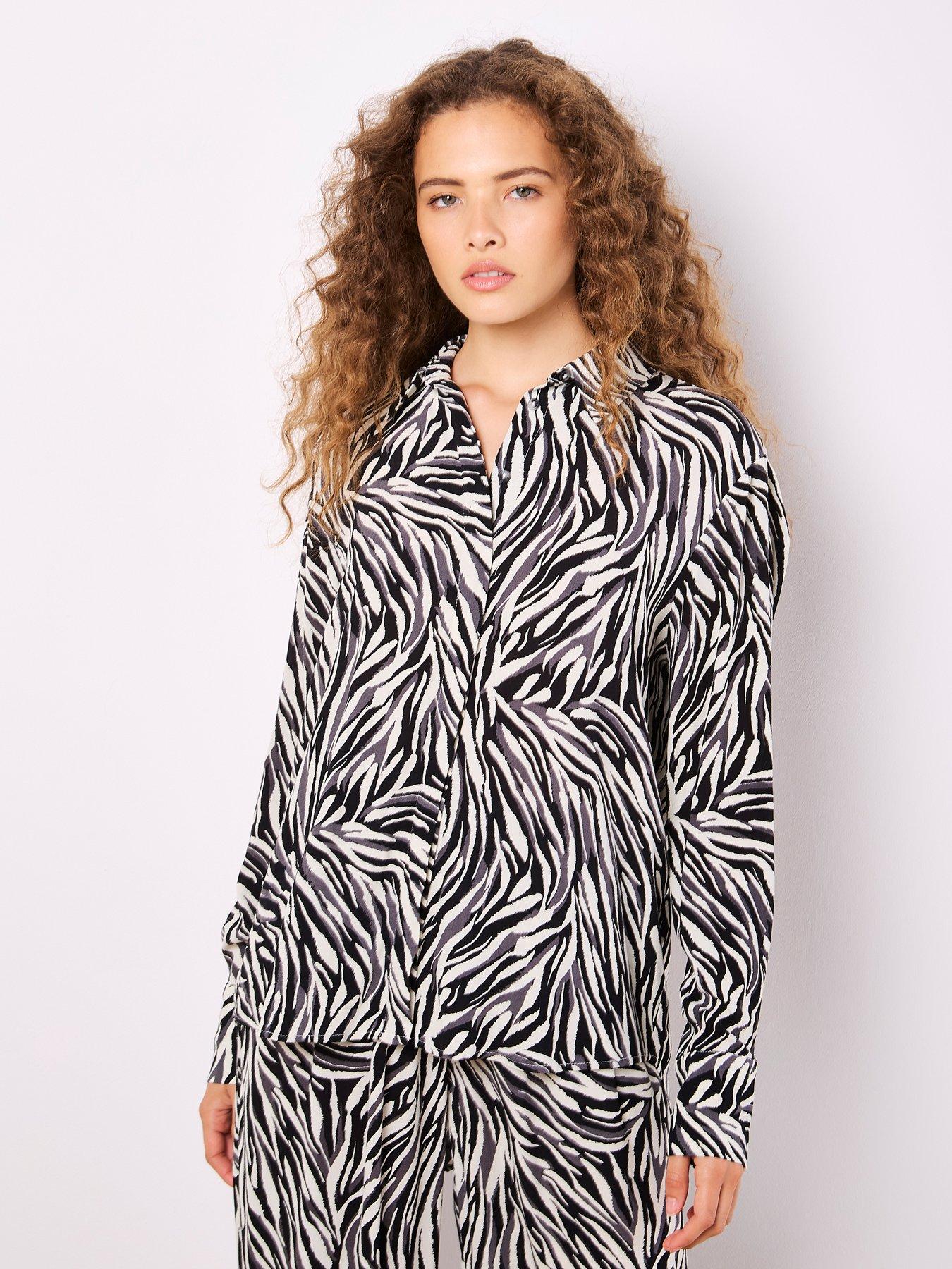  image of apricot-zebra-printed-high-low-shirt-stone