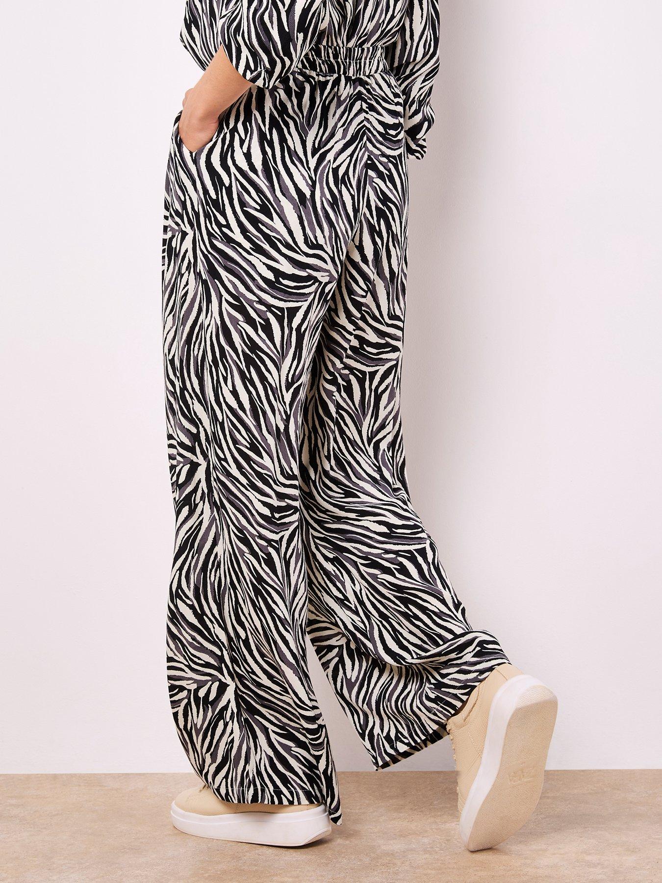  image of apricot-zebra-wide-leg-printed-trouser-stone