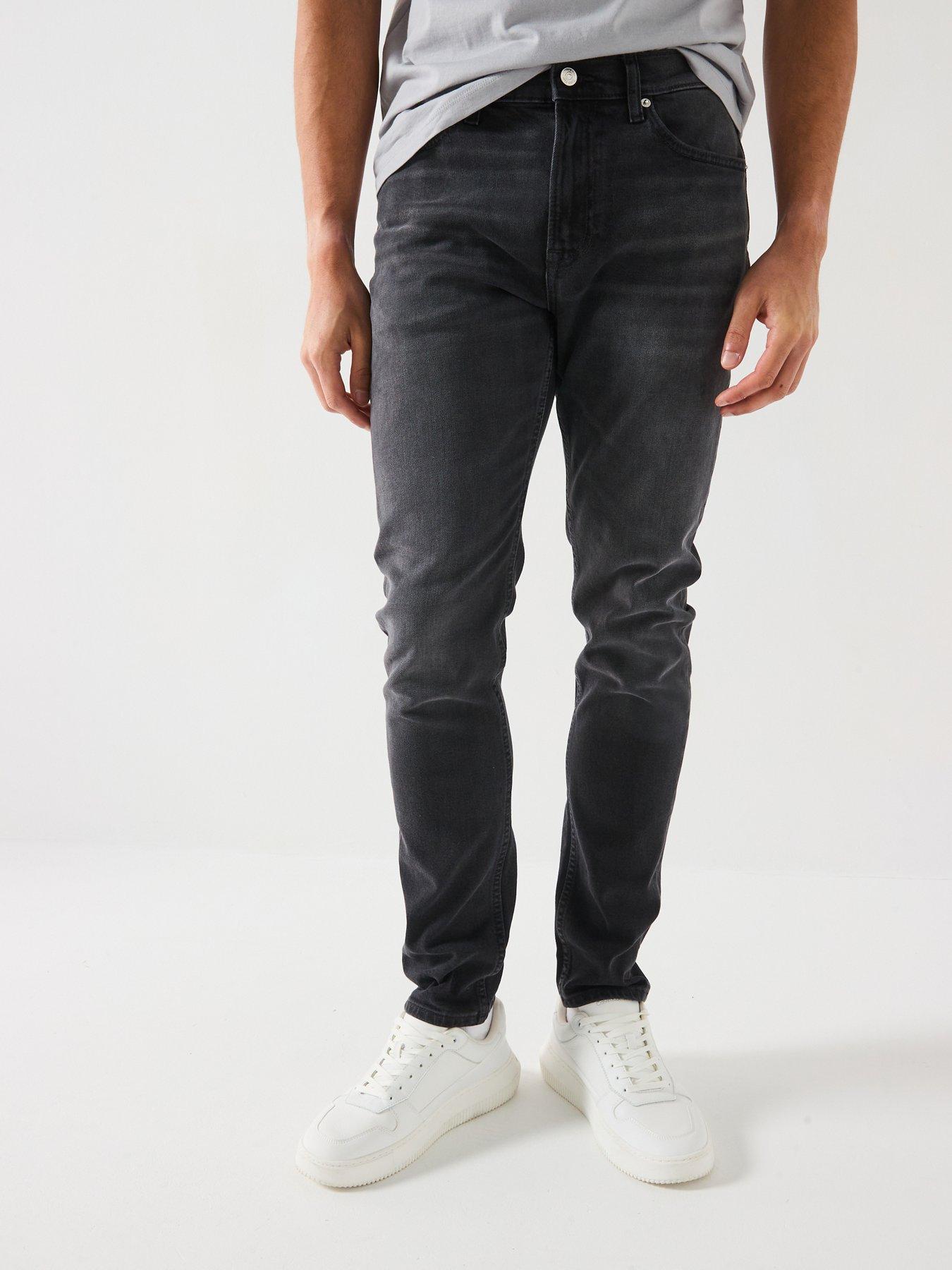 Image 1 of 6 of Calvin Klein Jeans Slim Taper Jeans - Black