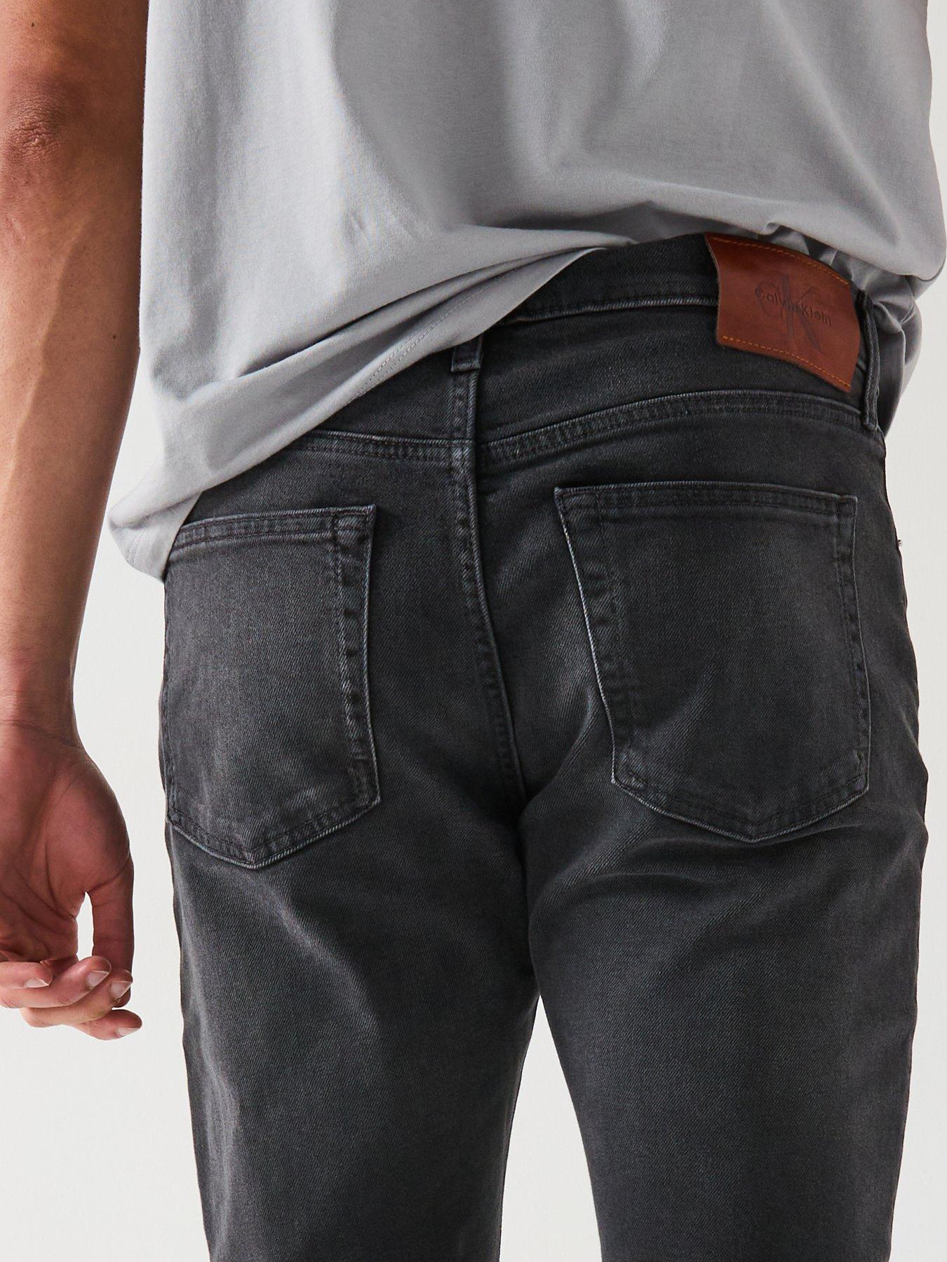 Image 4 of 6 of Calvin Klein Jeans Slim Taper Jeans - Black