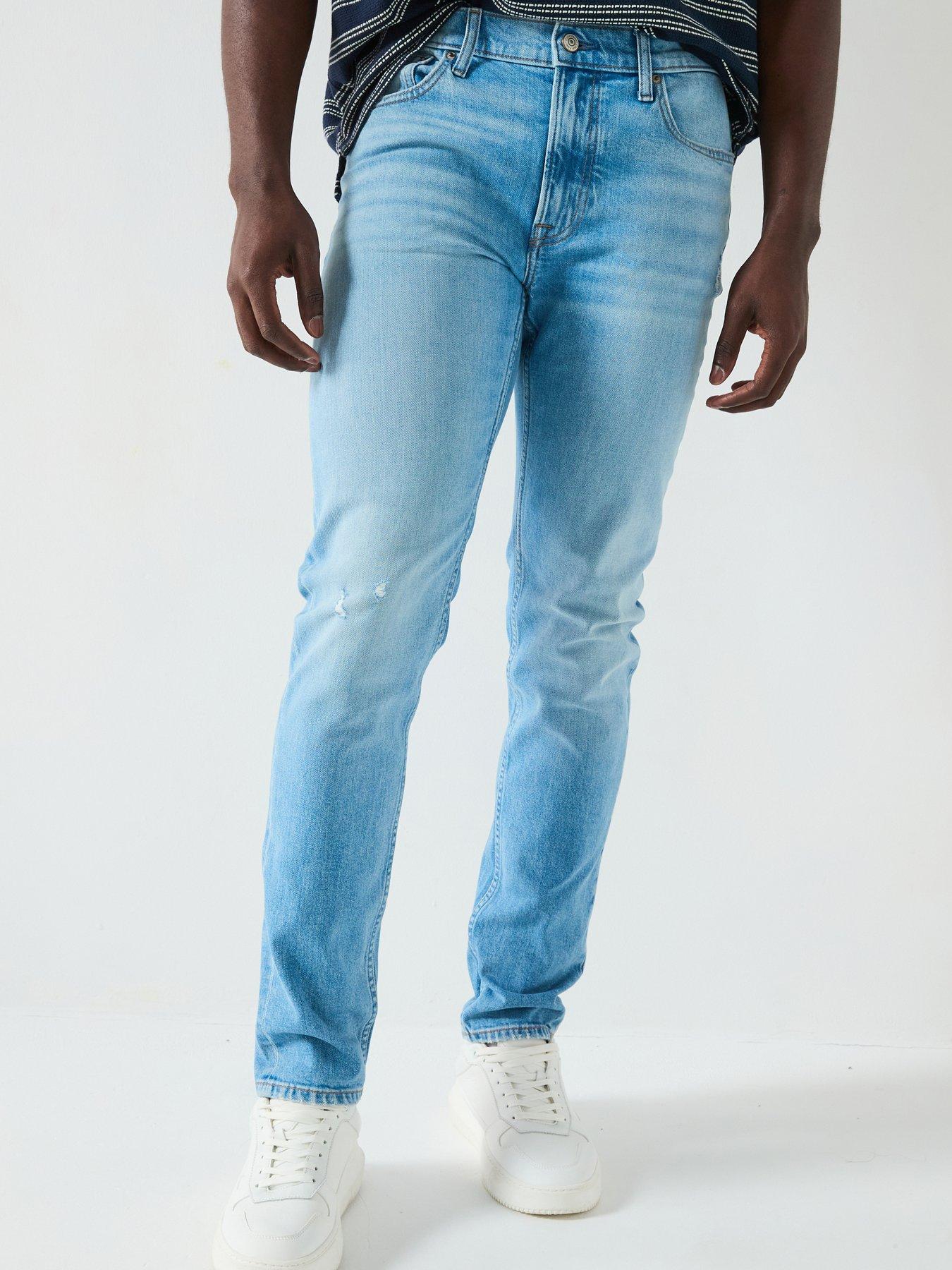 Image 1 of 6 of Calvin Klein Jeans Slim Taper - Light Wash