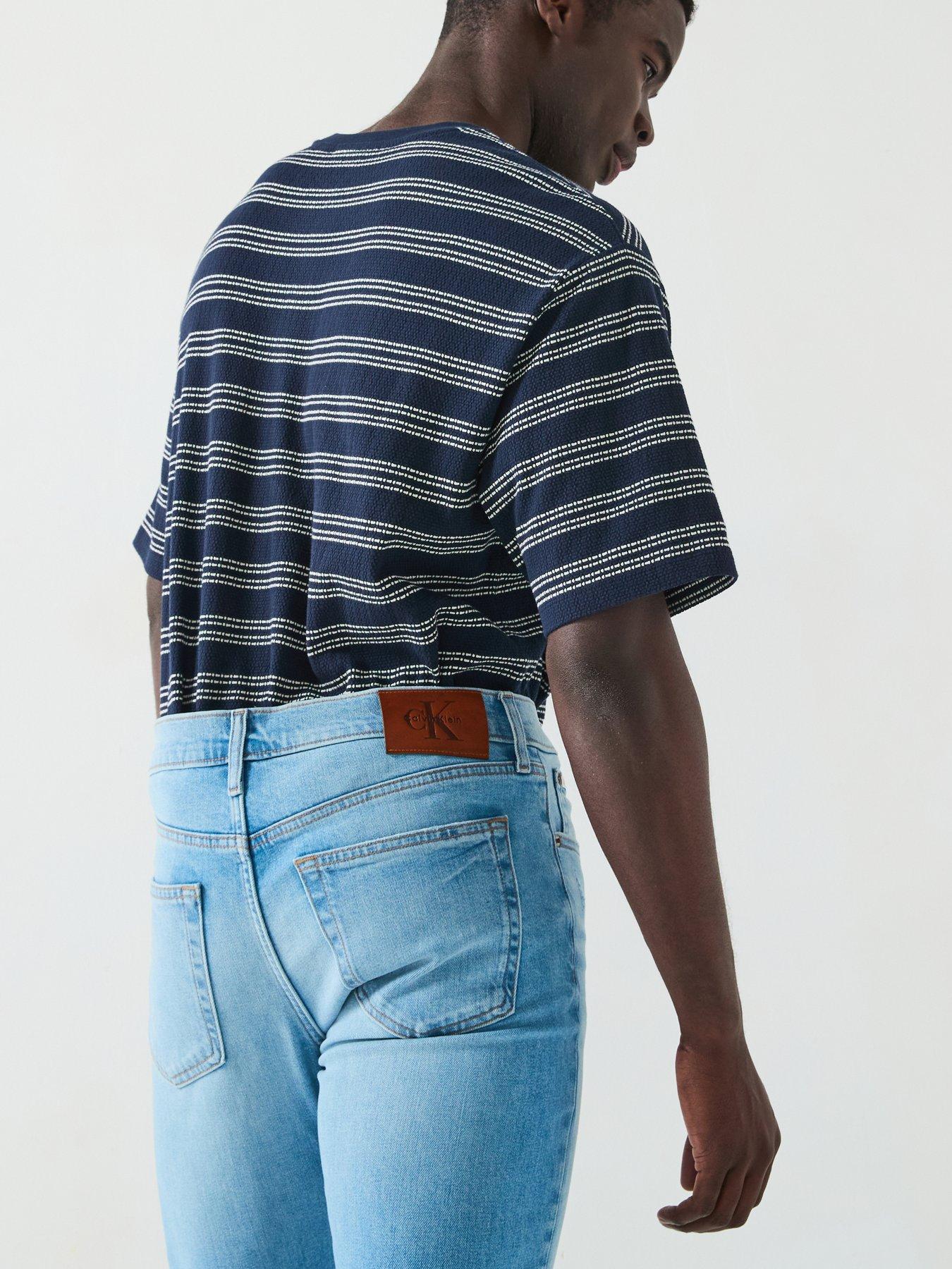 Image 4 of 6 of Calvin Klein Jeans Slim Taper - Light Wash