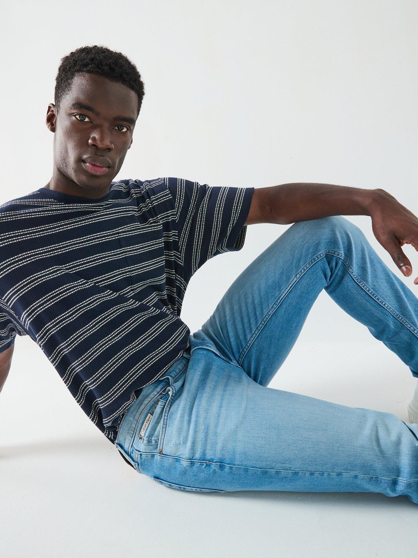 Image 5 of 6 of Calvin Klein Jeans Slim Taper - Light Wash