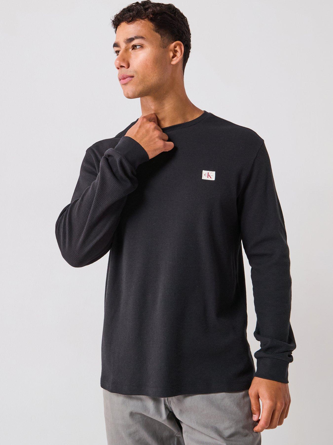  image of calvin-klein-jeans-left-chest-woven-badge-waffle-long-sleeve-t-shirt-black