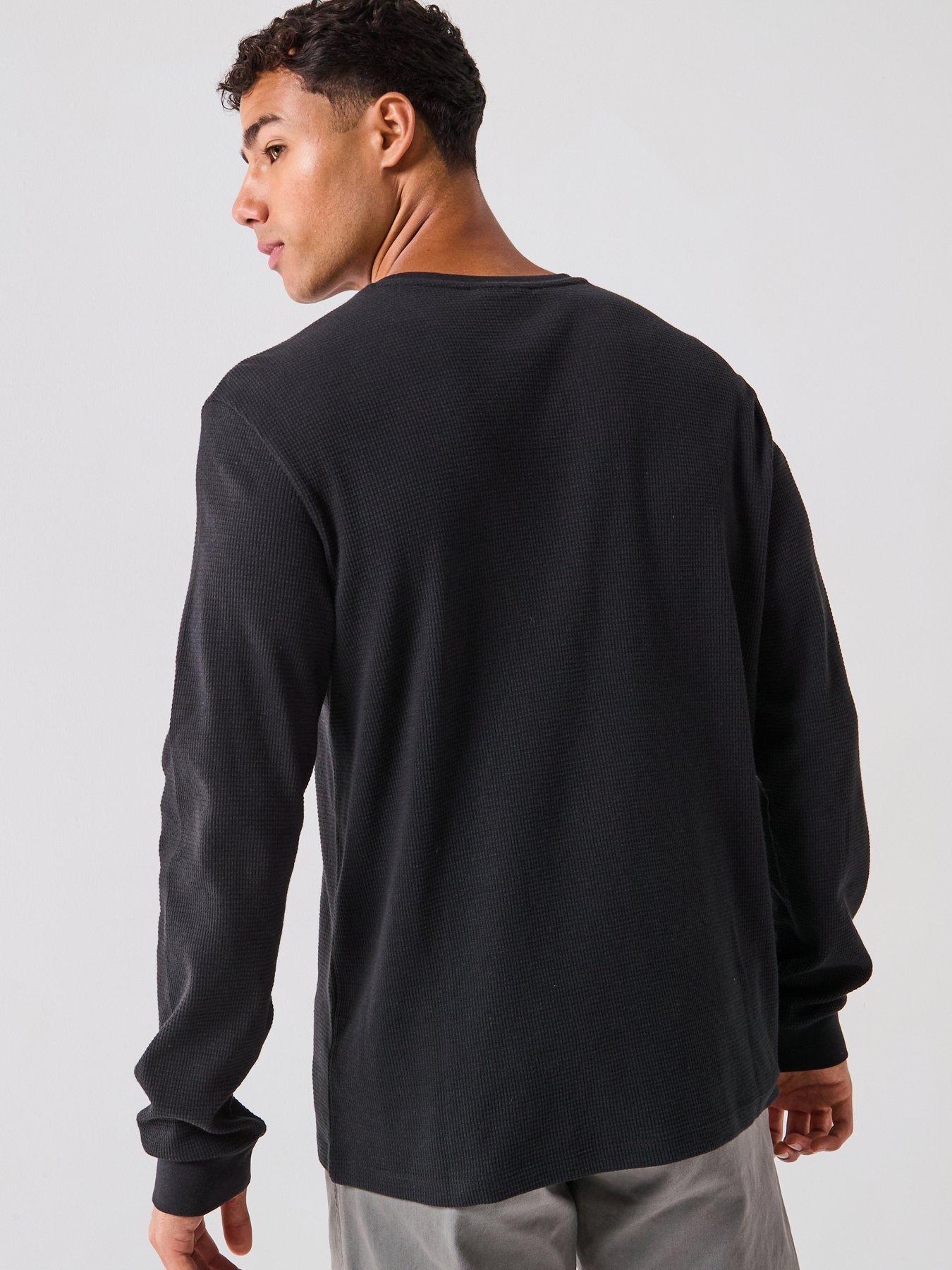 image of calvin-klein-jeans-left-chest-woven-badge-waffle-long-sleeve-t-shirt-black