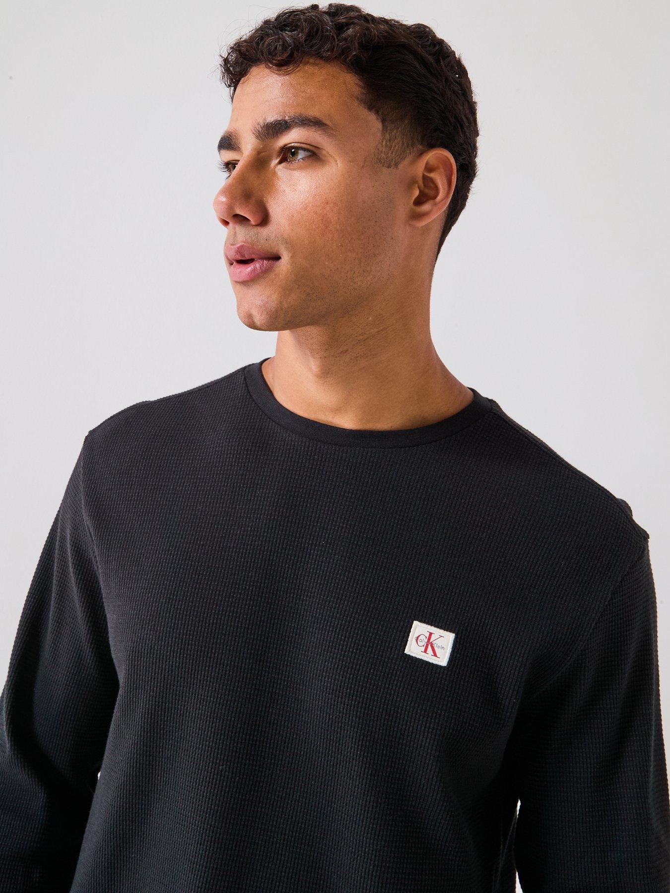  image of calvin-klein-jeans-left-chest-woven-badge-waffle-long-sleeve-t-shirt-black