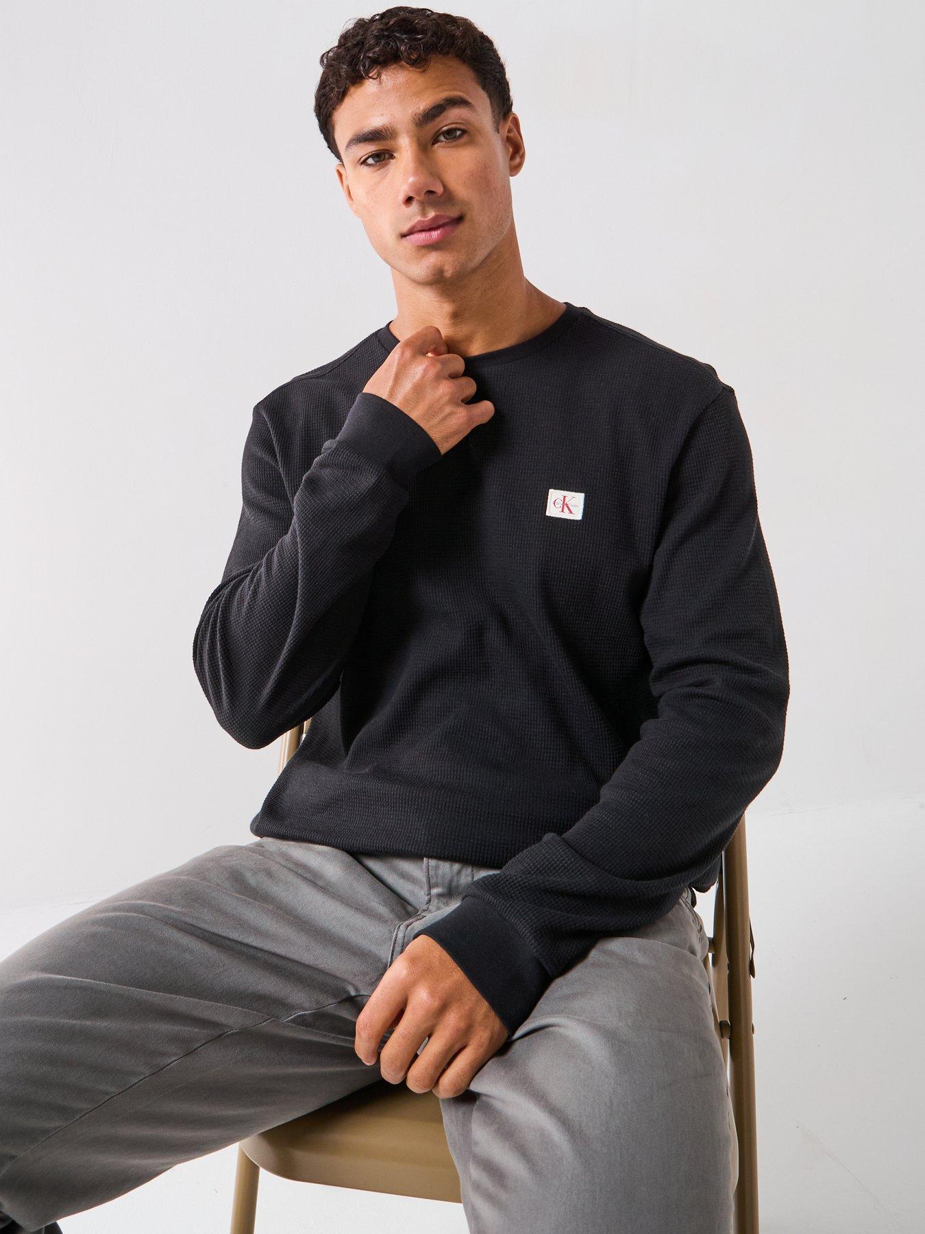  image of calvin-klein-jeans-left-chest-woven-badge-waffle-long-sleeve-t-shirt-black