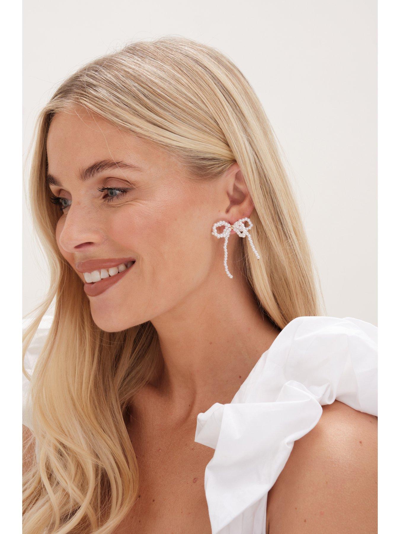  image of mood-gold-pearl-bow-drop-earrings