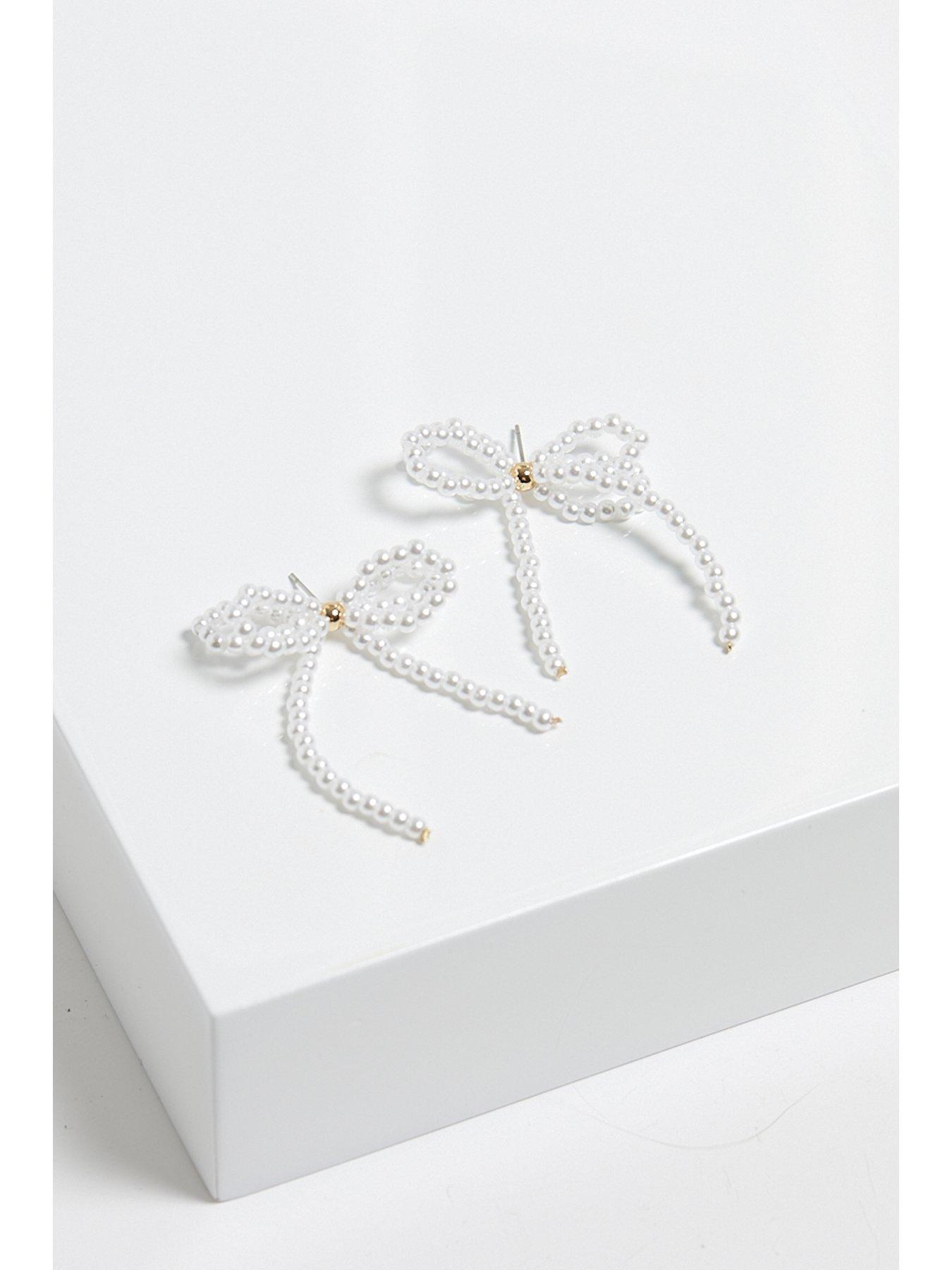  image of mood-gold-pearl-bow-drop-earrings