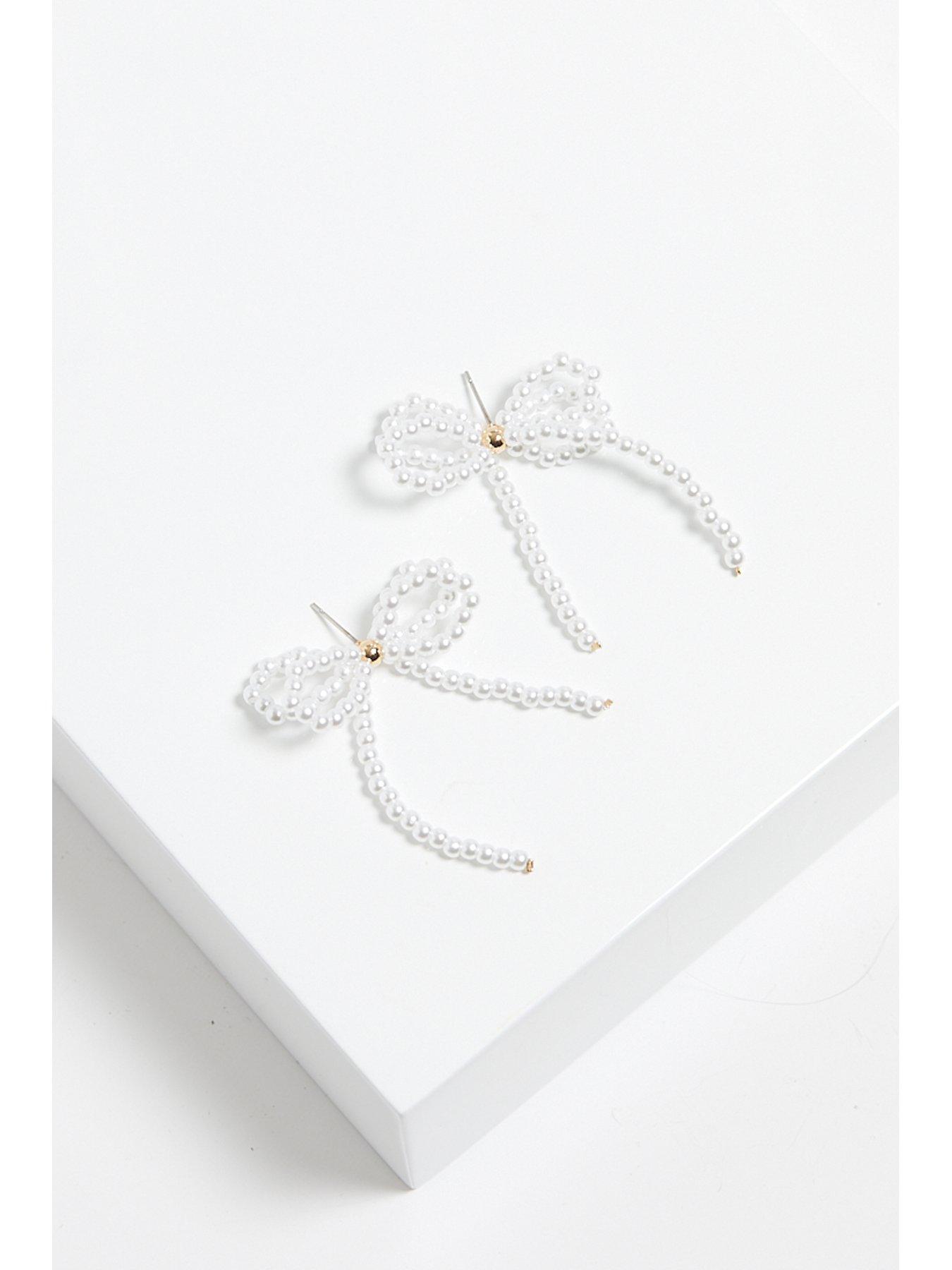  image of mood-gold-pearl-bow-drop-earrings