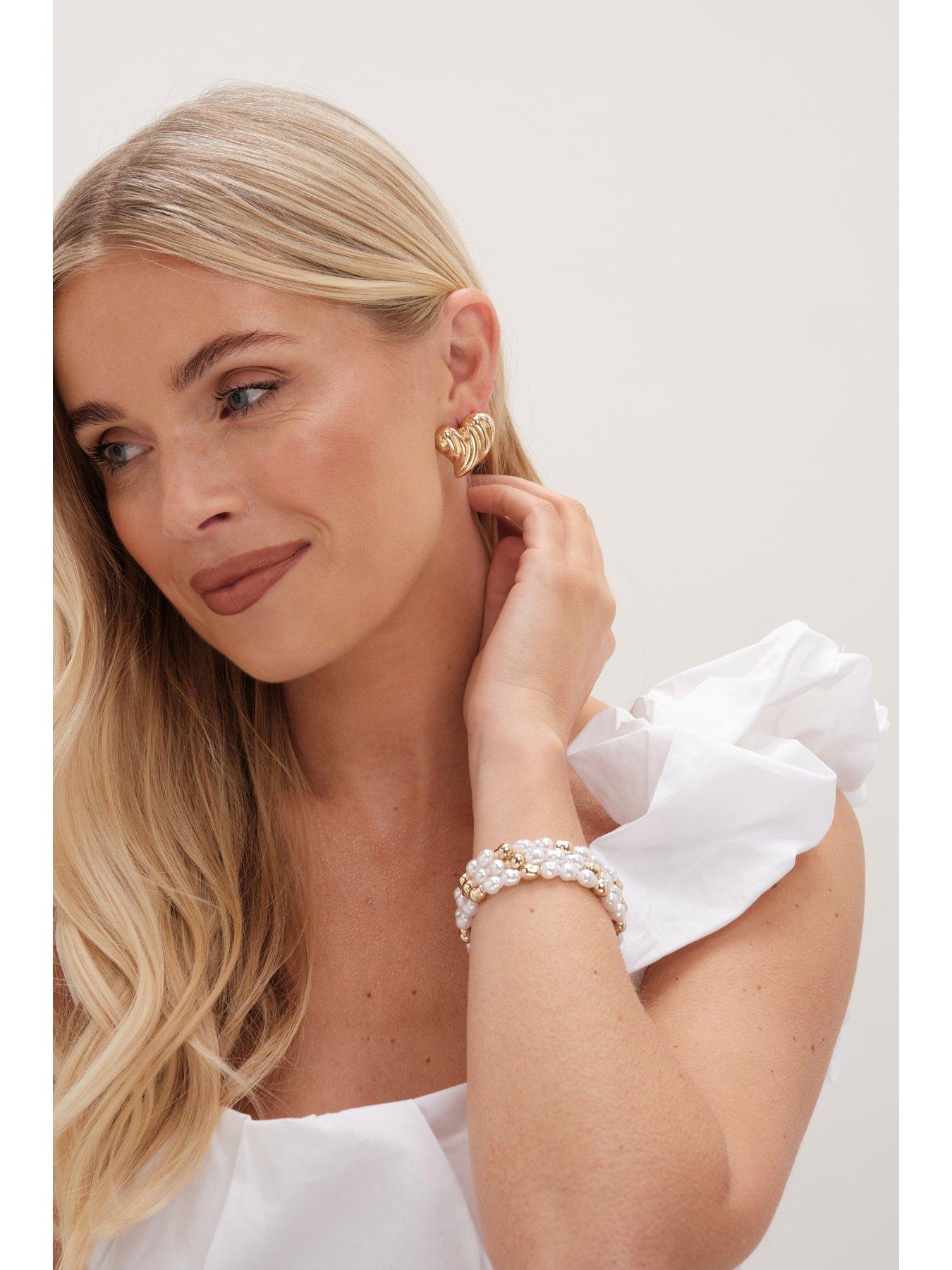  image of mood-gold-ridged-heart-stud-earrings