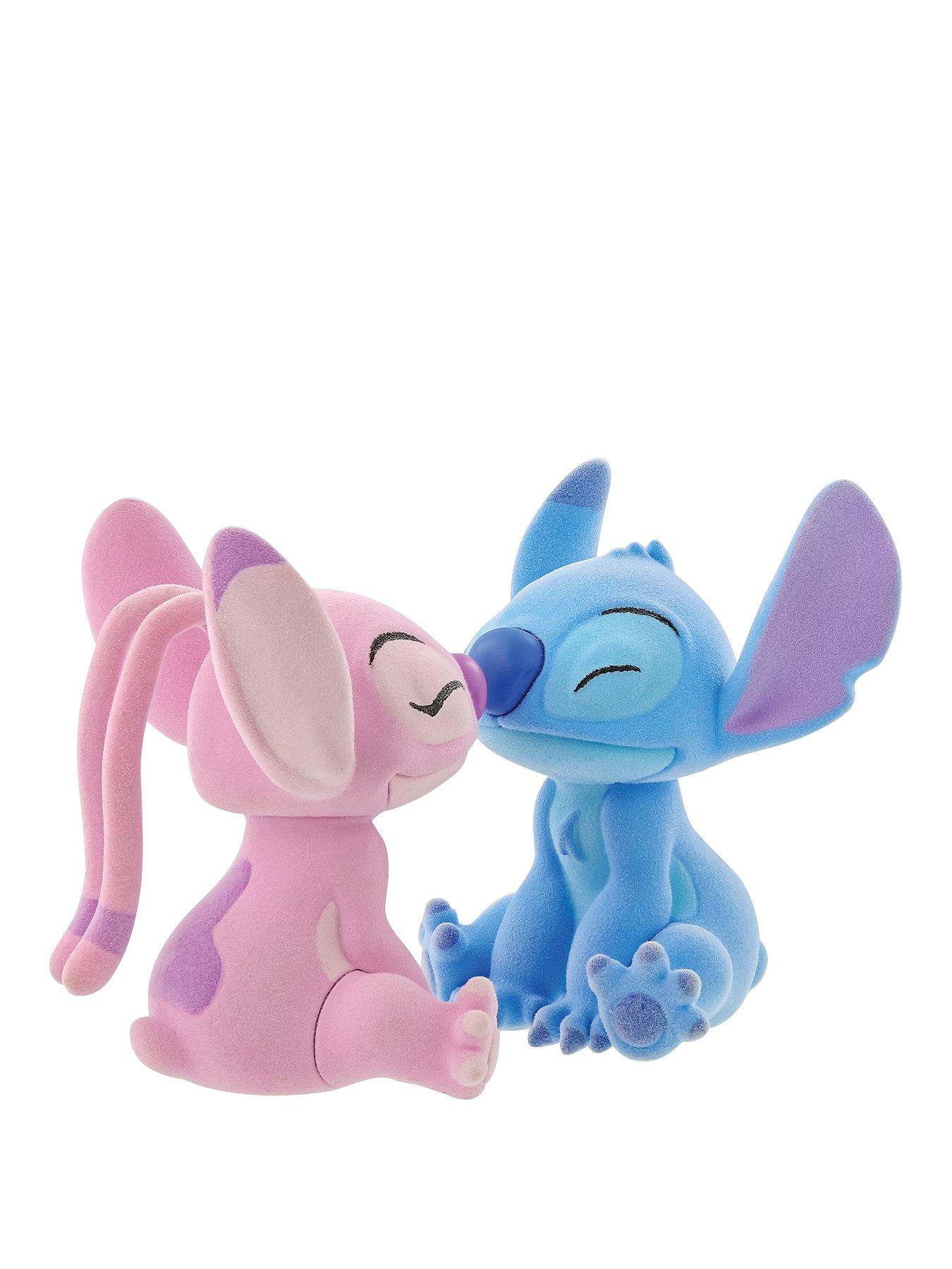 Flocked Kissing Stitch and Angel Figurines