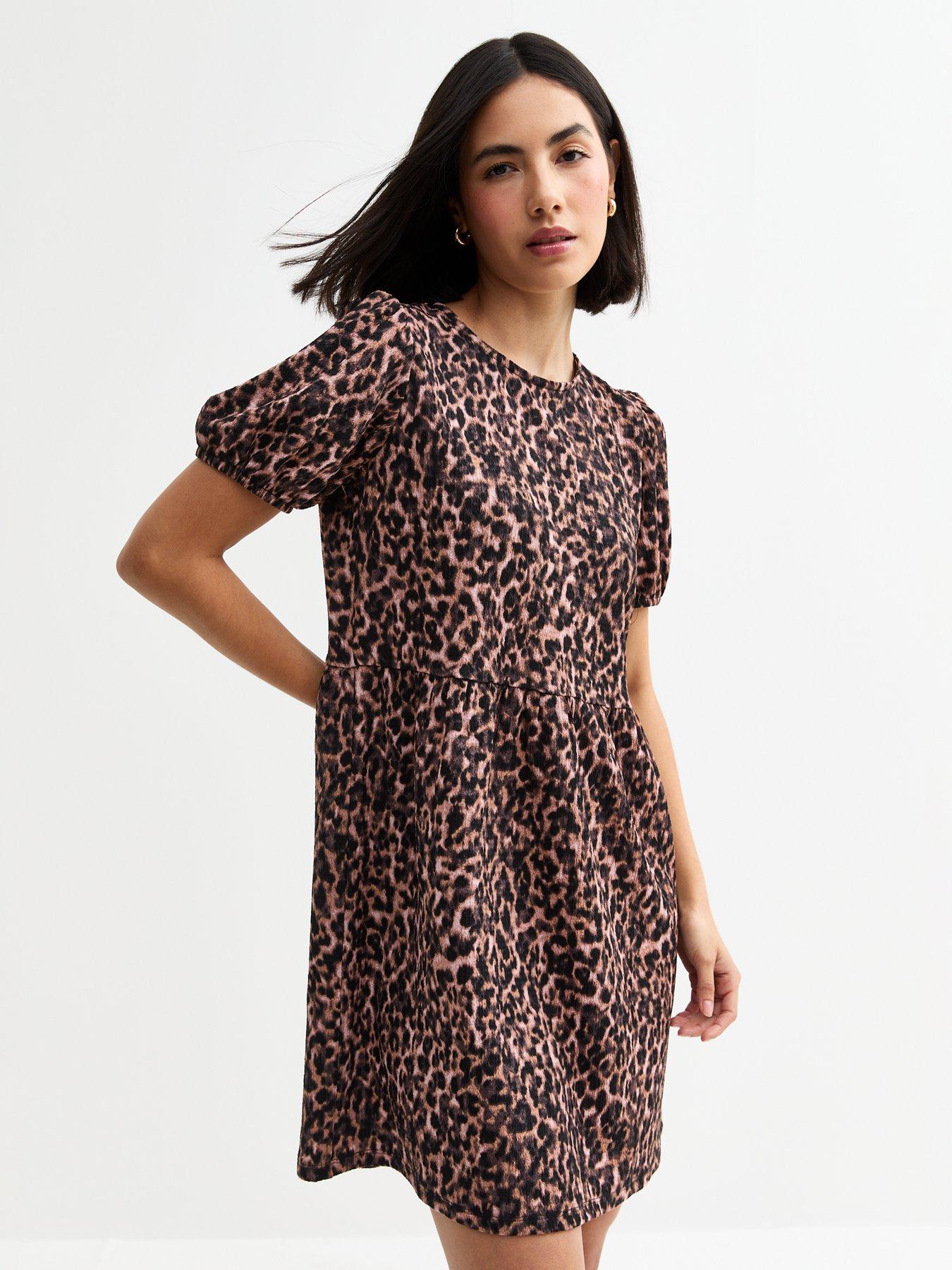front image of new-look-brown-leopard-print-bow-back-mini-dress