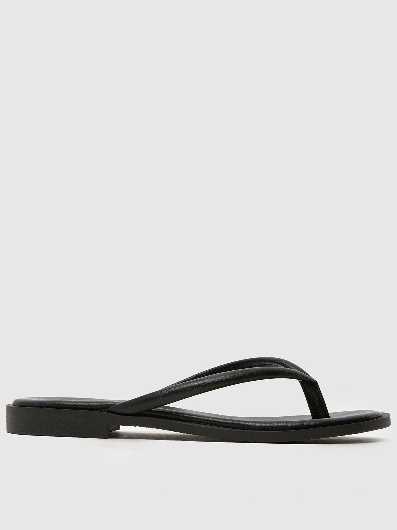 schuh-tulia-toe-post-flat-sandal-black